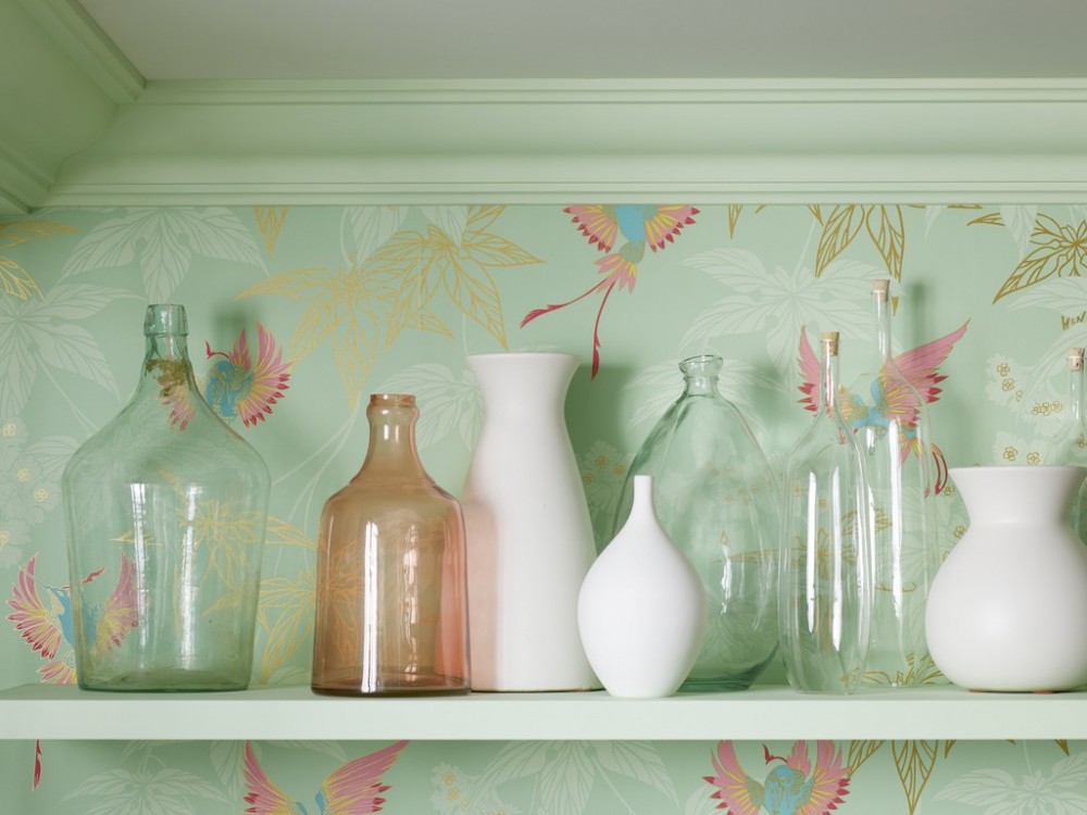   Keep accessories simple against an intricately patterned wall.  