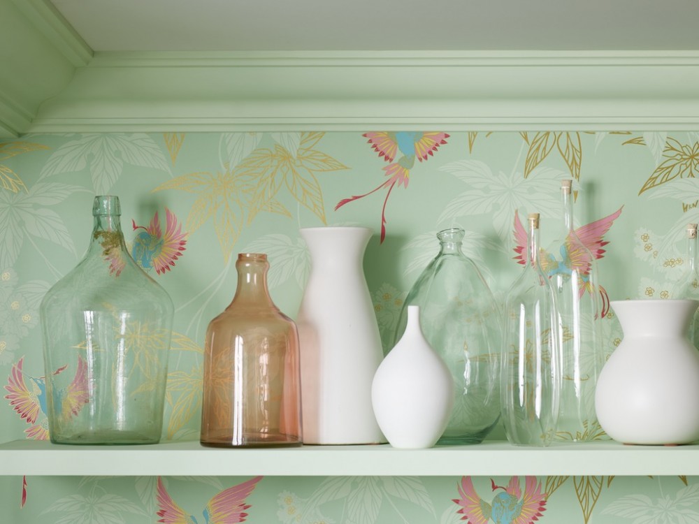 Keep accessories simple against an intricately patterned wall.