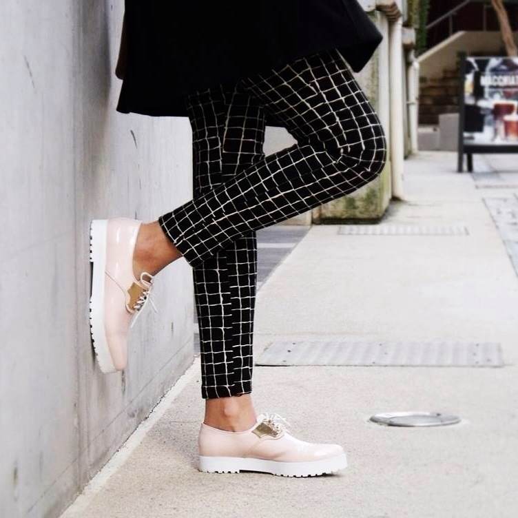   Geometric patterns and menswear-inspired brogues in a petal-soft hue. Something tells us Chaplin would have approved.  