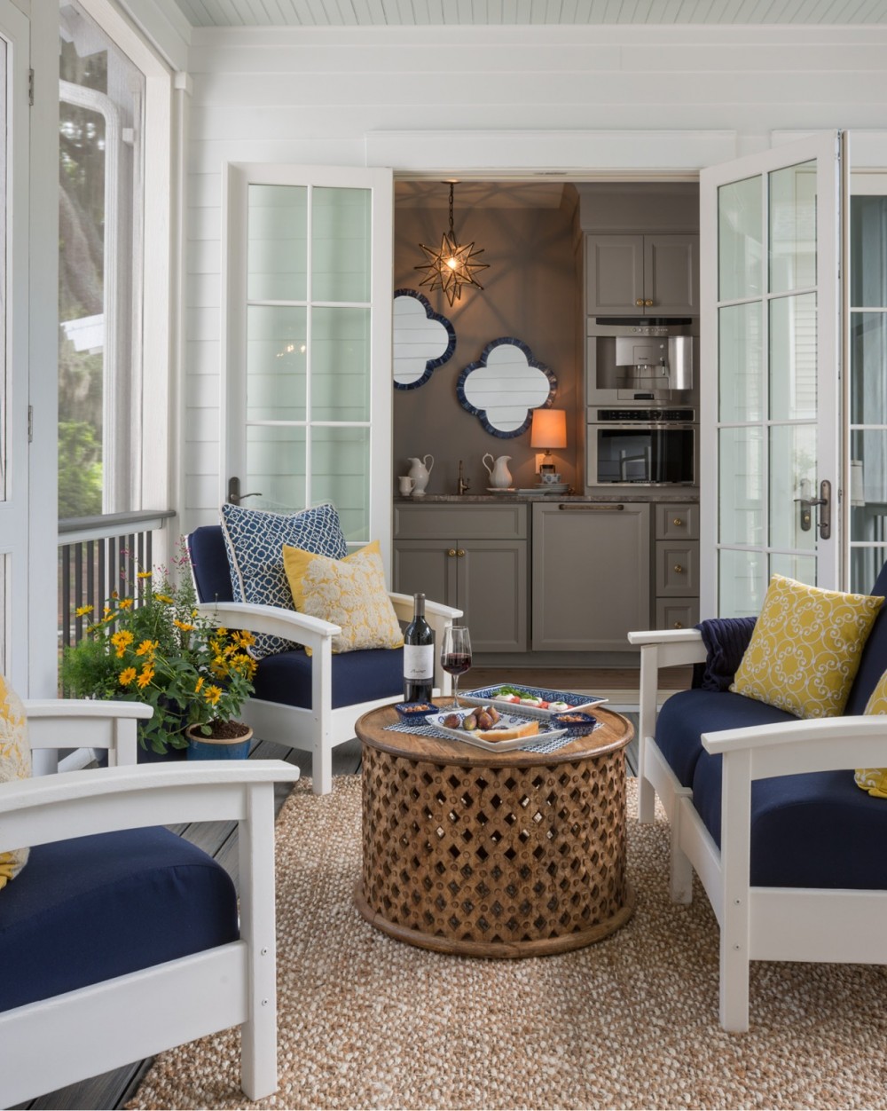   The side screened porch connects the main home with the carriage house guest quarters.  