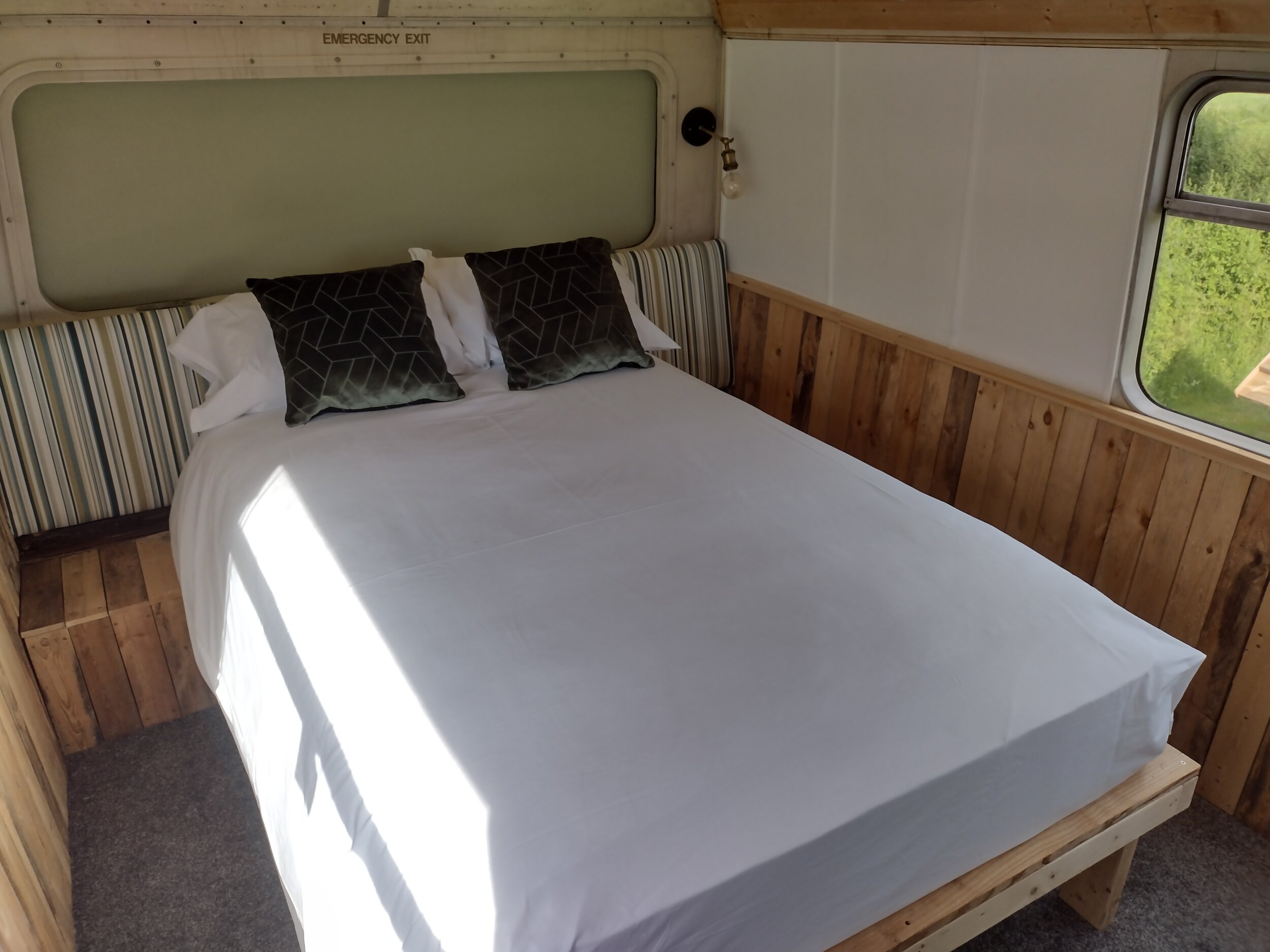 Stanford Farm's double decker bus conversion upstairs bedroom 1