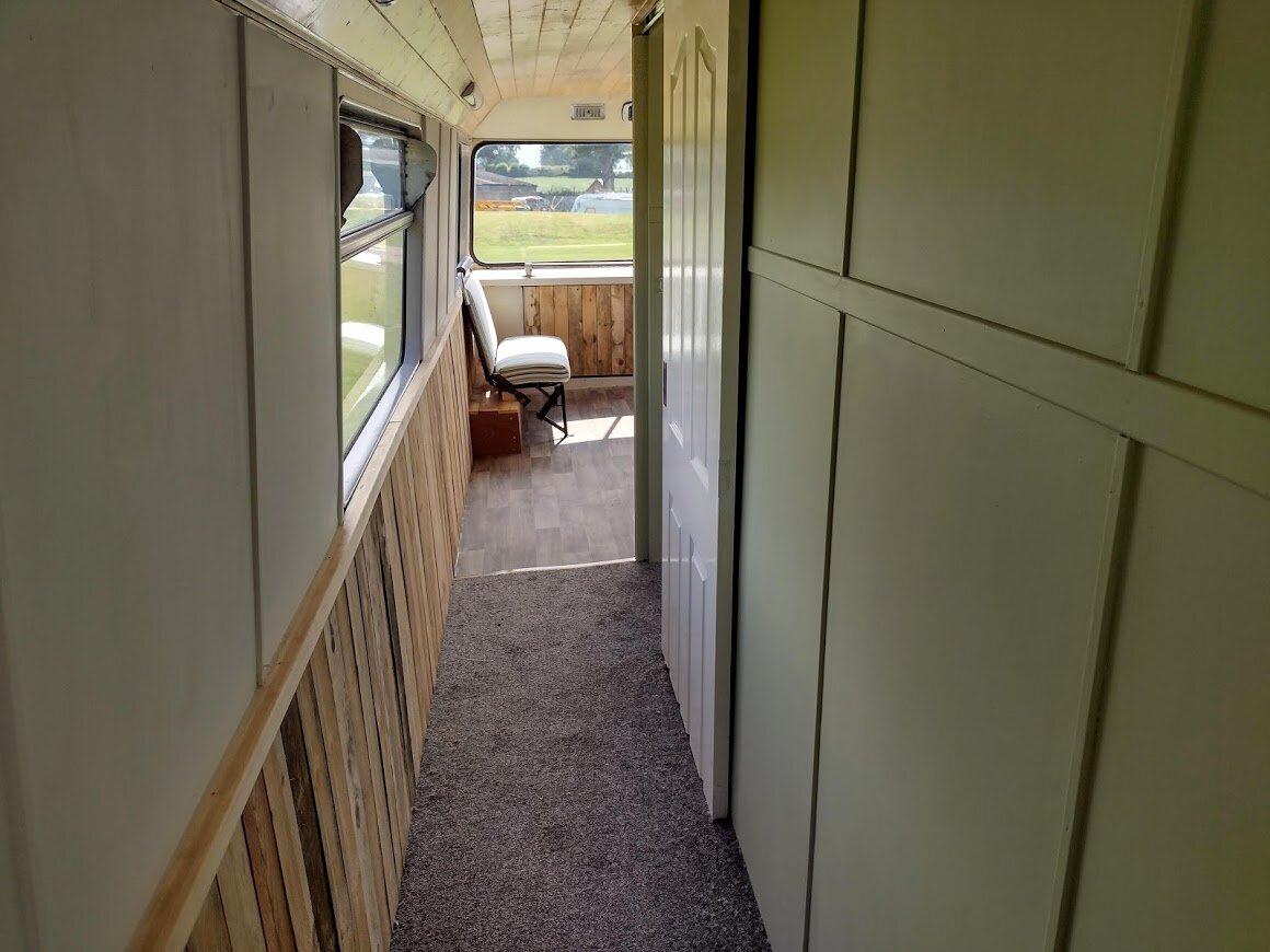 Stanford Farm's double decker bus conversion upstairs