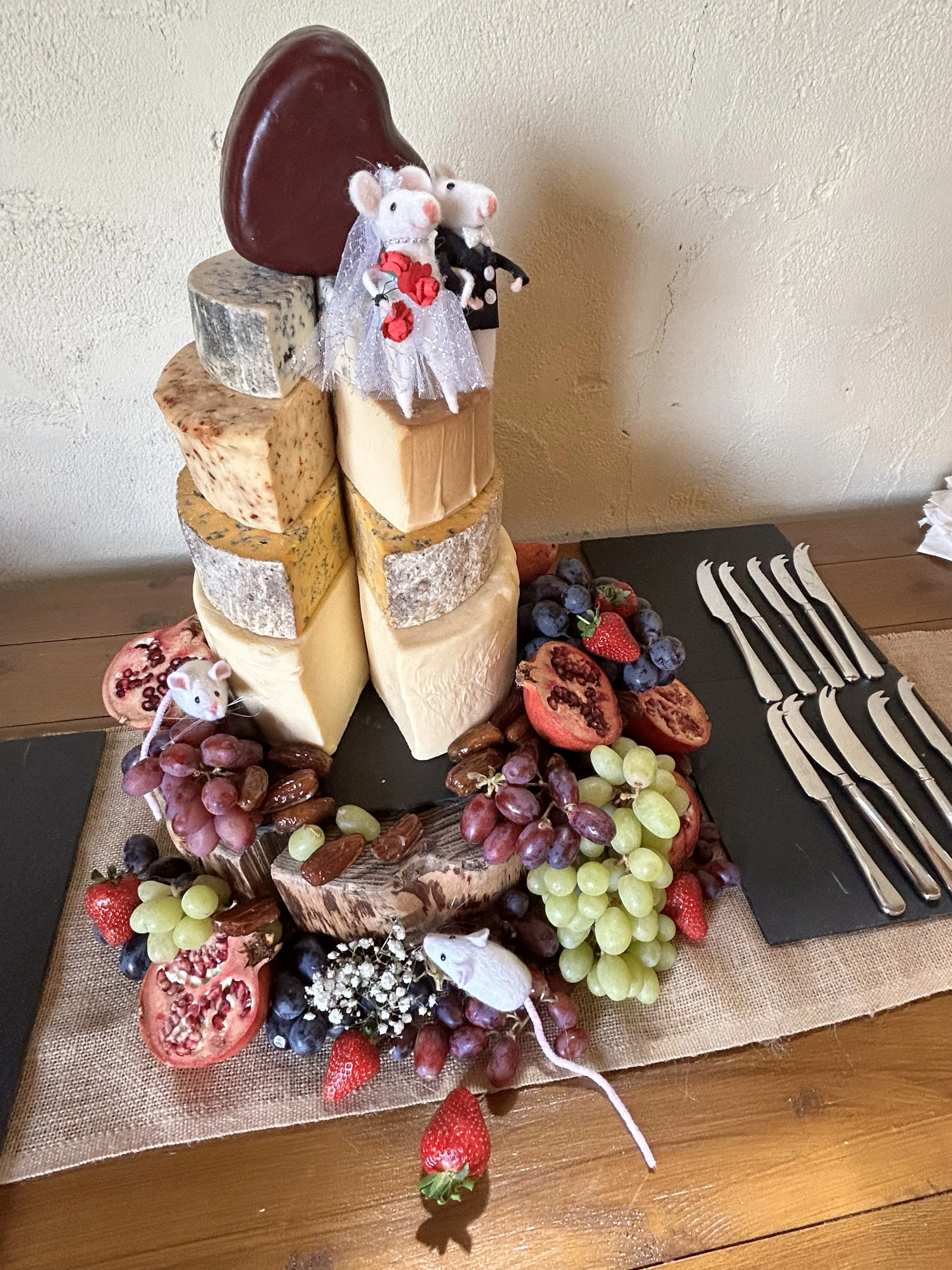 Wedding cake made of cheese at Karen and Steve's 4 day Wedding at Stanford Farm in Shropshire 25th May 2024