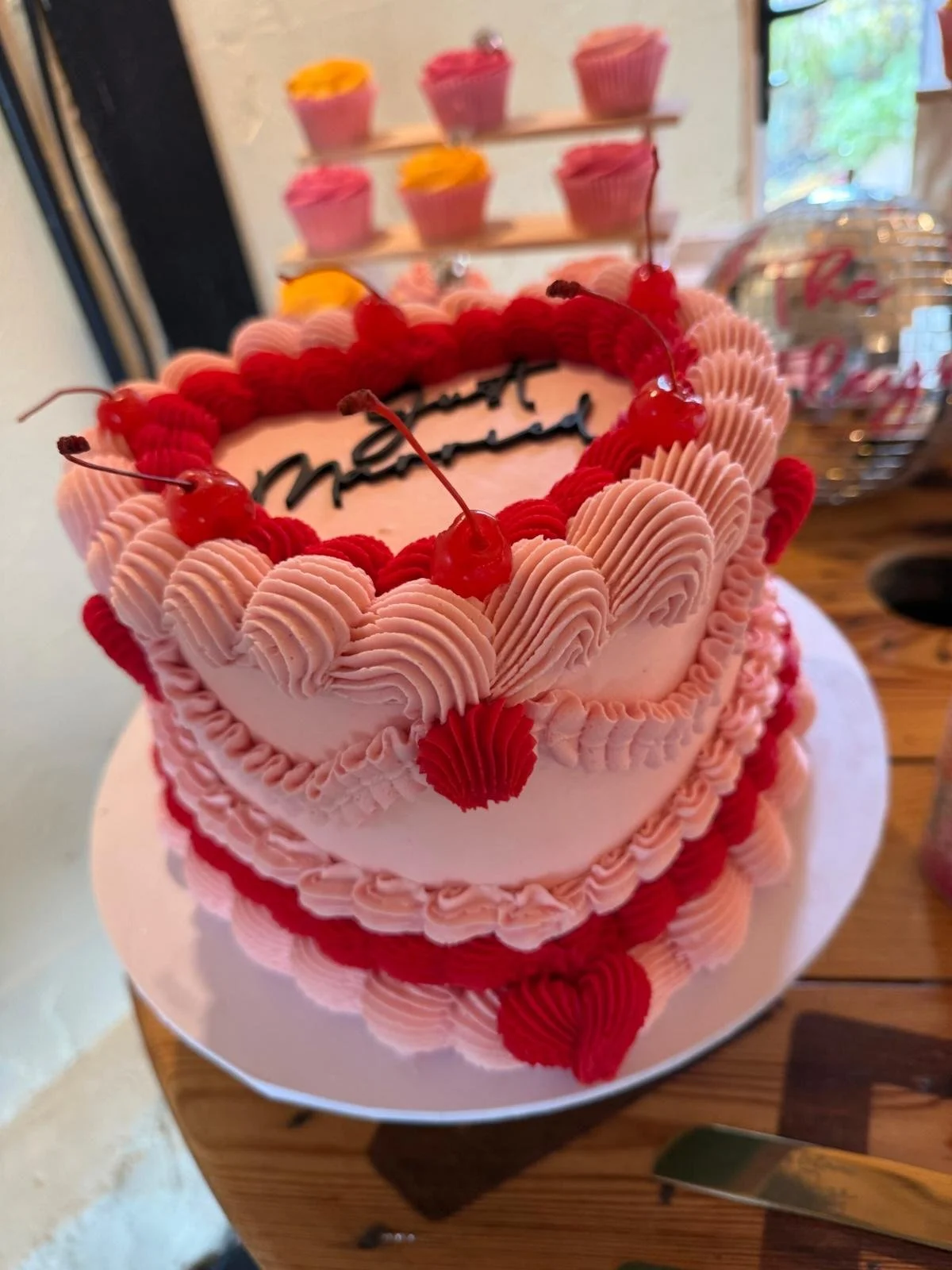 Heart shaped wedding cake at Emma and Andrew’s wedding at Stanford Farm in Shropshire on Saturday 4th October