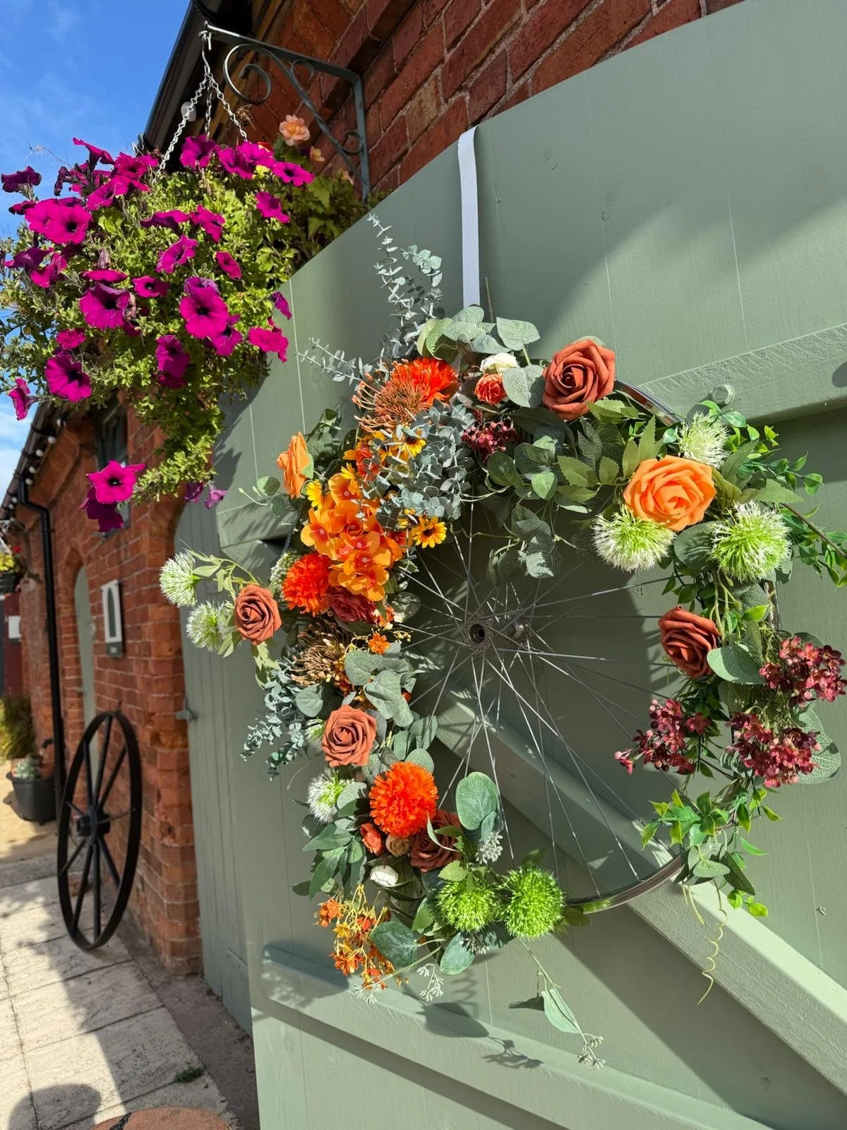 Autumn garland outside the Stables for Hannah and Nathan's wedding at Stanford Farm