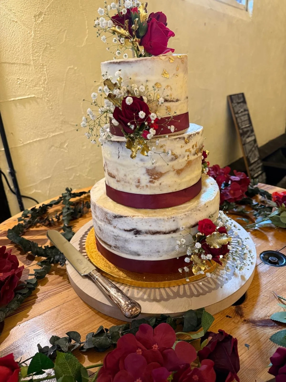 Festive wedding cake at Katie &amp; Ryan’s Festive December Wedding at Stanford Farm