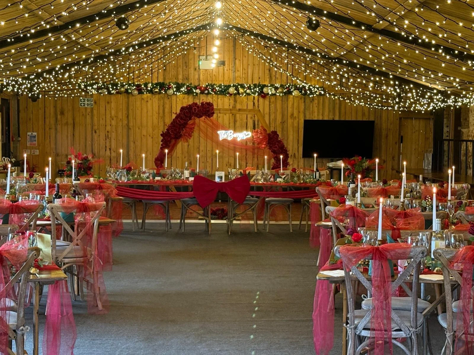 The Cowhouse decorated for Katie &amp; Ryan’s Festive December Wedding at Stanford Farm