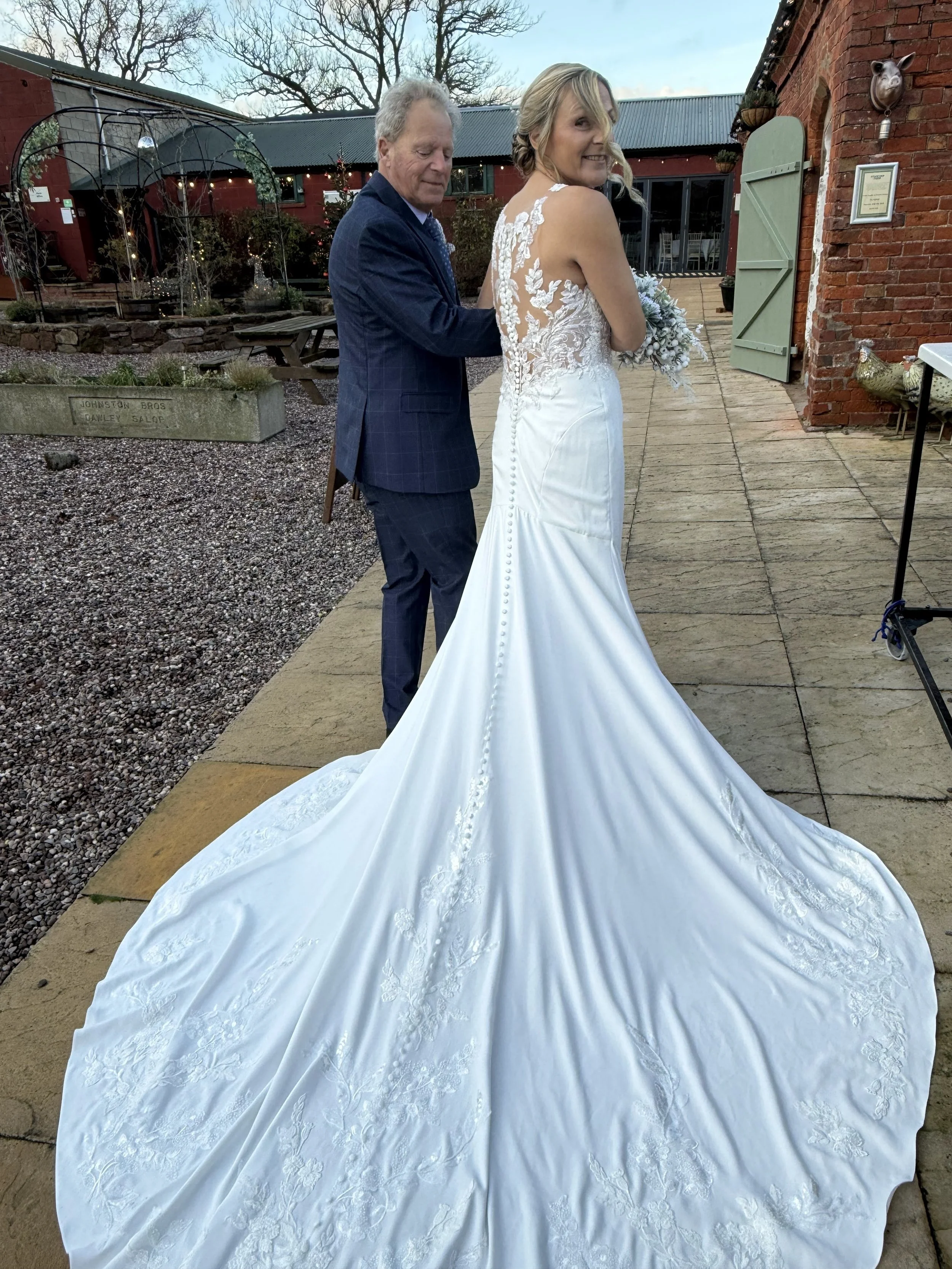 Jodie entering the stables at Jodie and Wayne’s Winter Wedding at Stanford Farm 20th December 2025