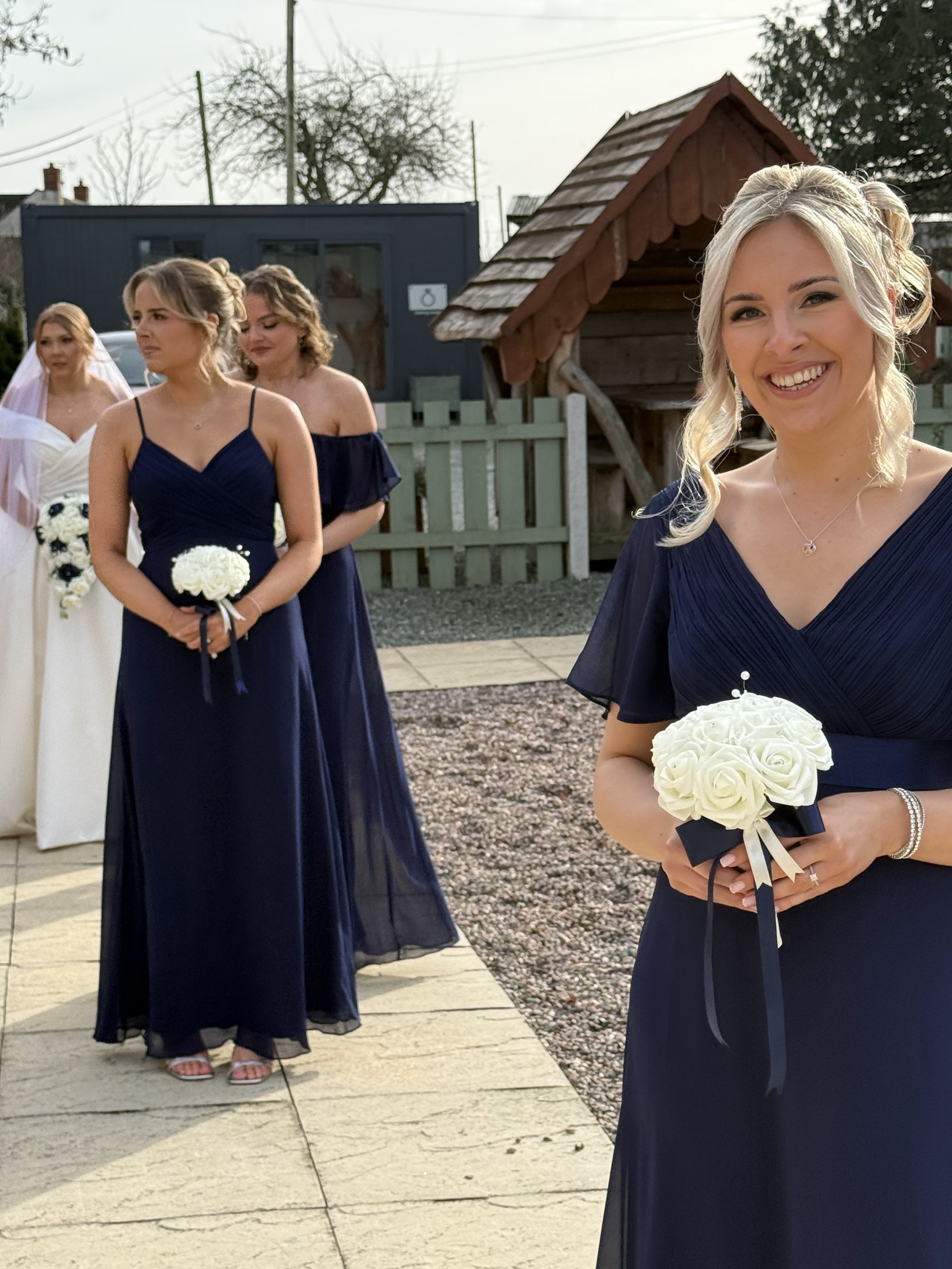 Bride and bridesmaids at Abbie and Dan’s Romantic Valentines Day wedding at Stanford Farm 