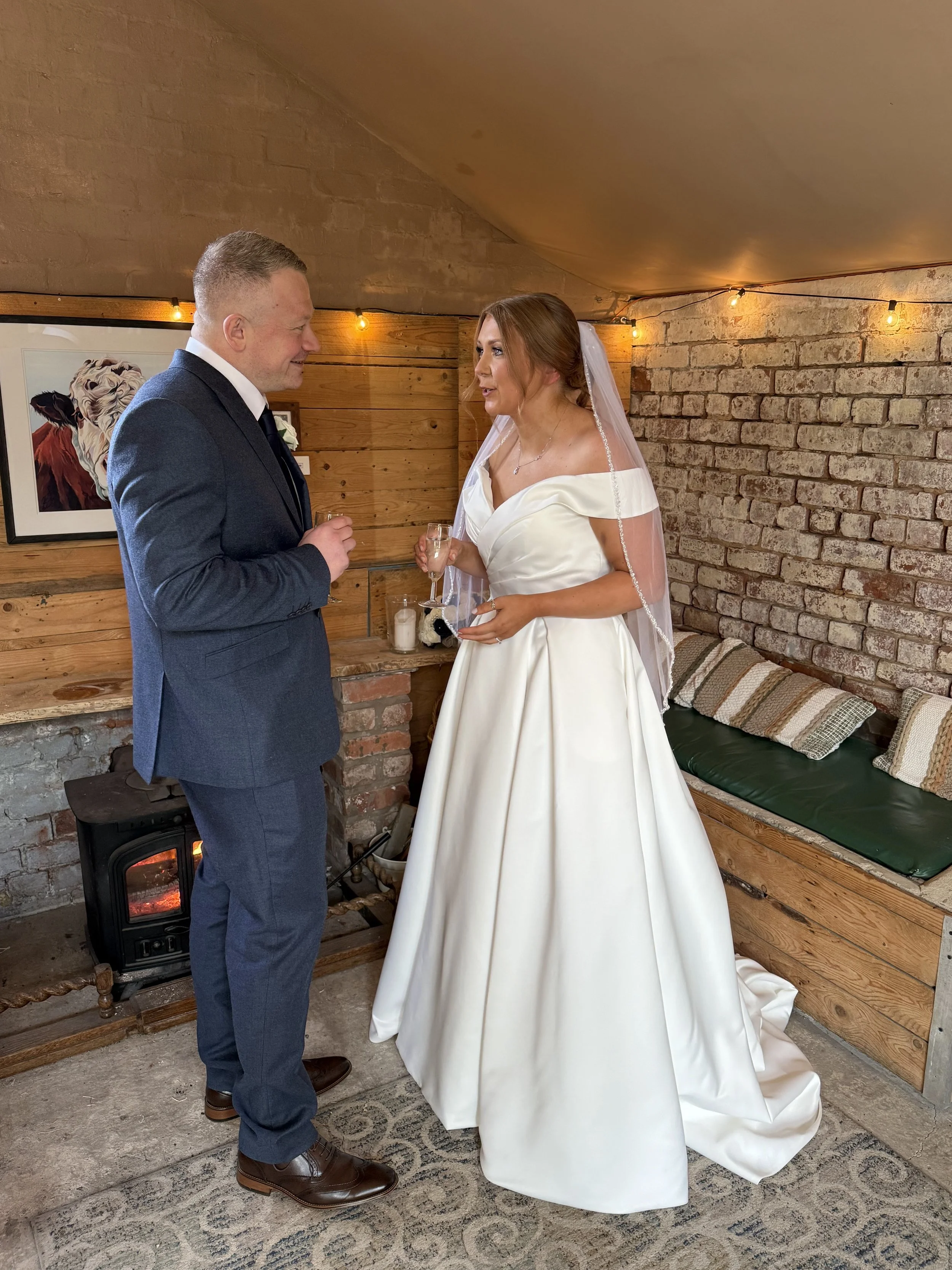 Post wedding drink in the Bull Bar at Abbie and Dan’s Romantic Valentines Day wedding at Stanford Farm 