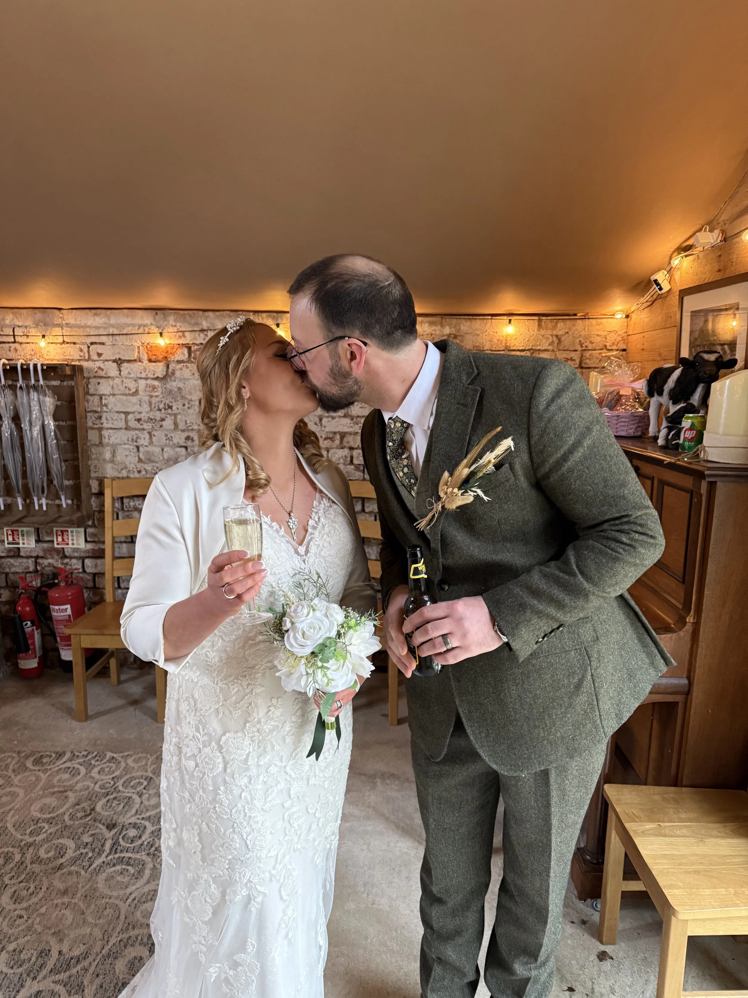 Sharon and Ben in the Bull Bar after their wedding at Stanford Farm in Shropshire