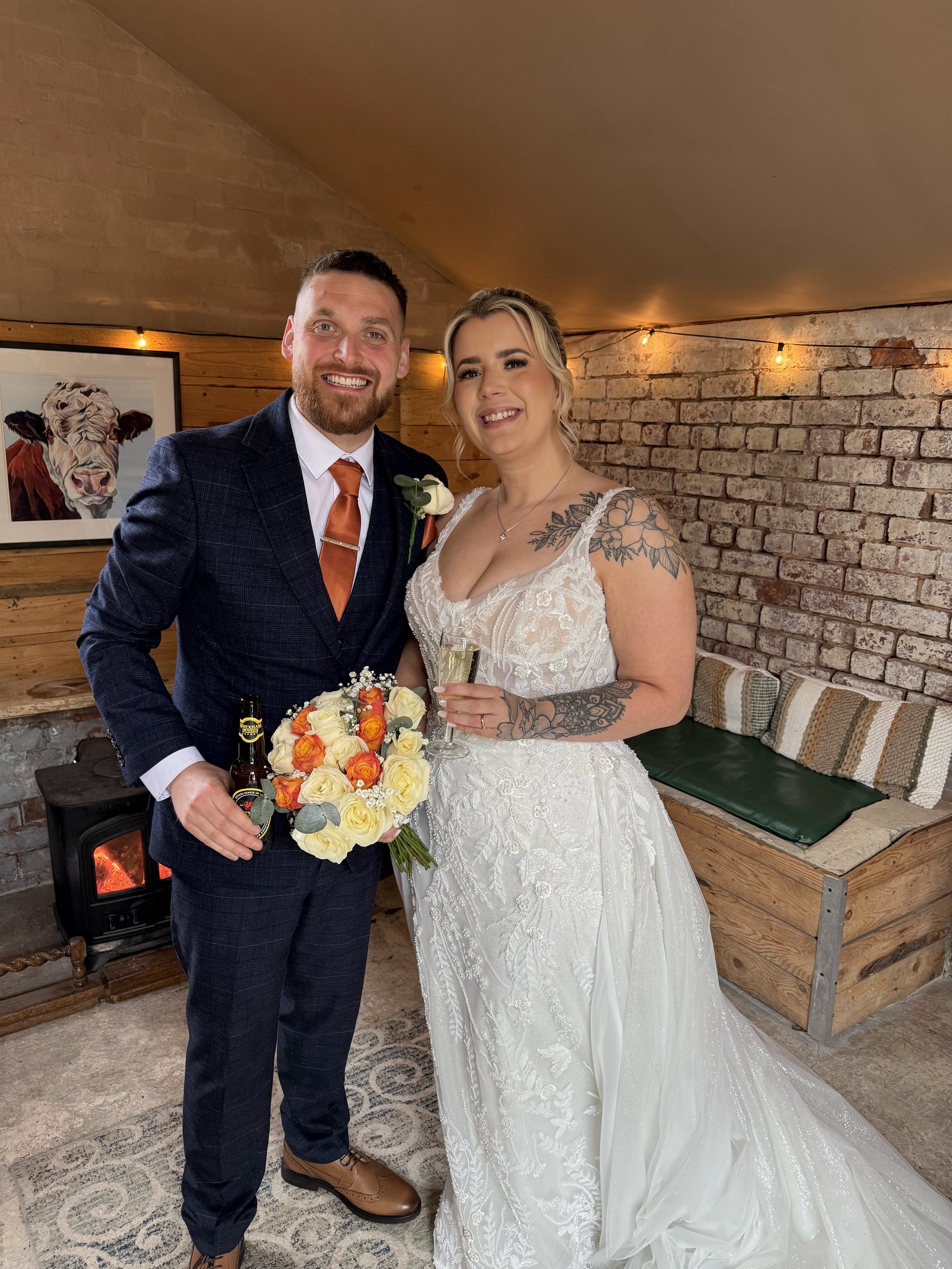 Katie and James in the Bull Bar at their wedding at Stanford Farm 1st April 2026