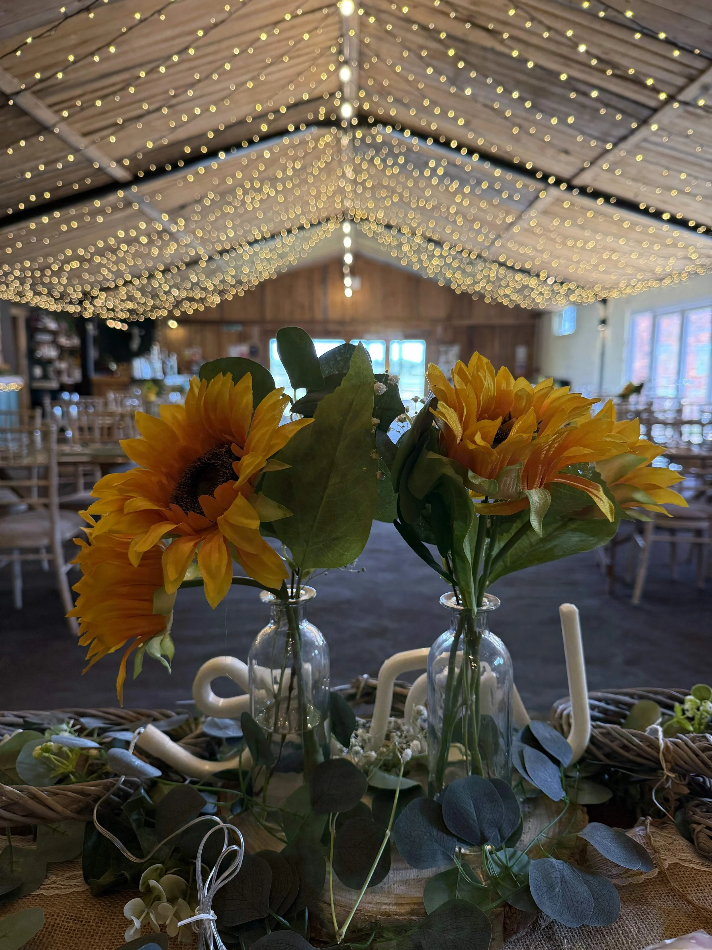 The Cowhouse decorated for the wedding breakfast - Charlie and Tom's Wedding at Stanford Farm
