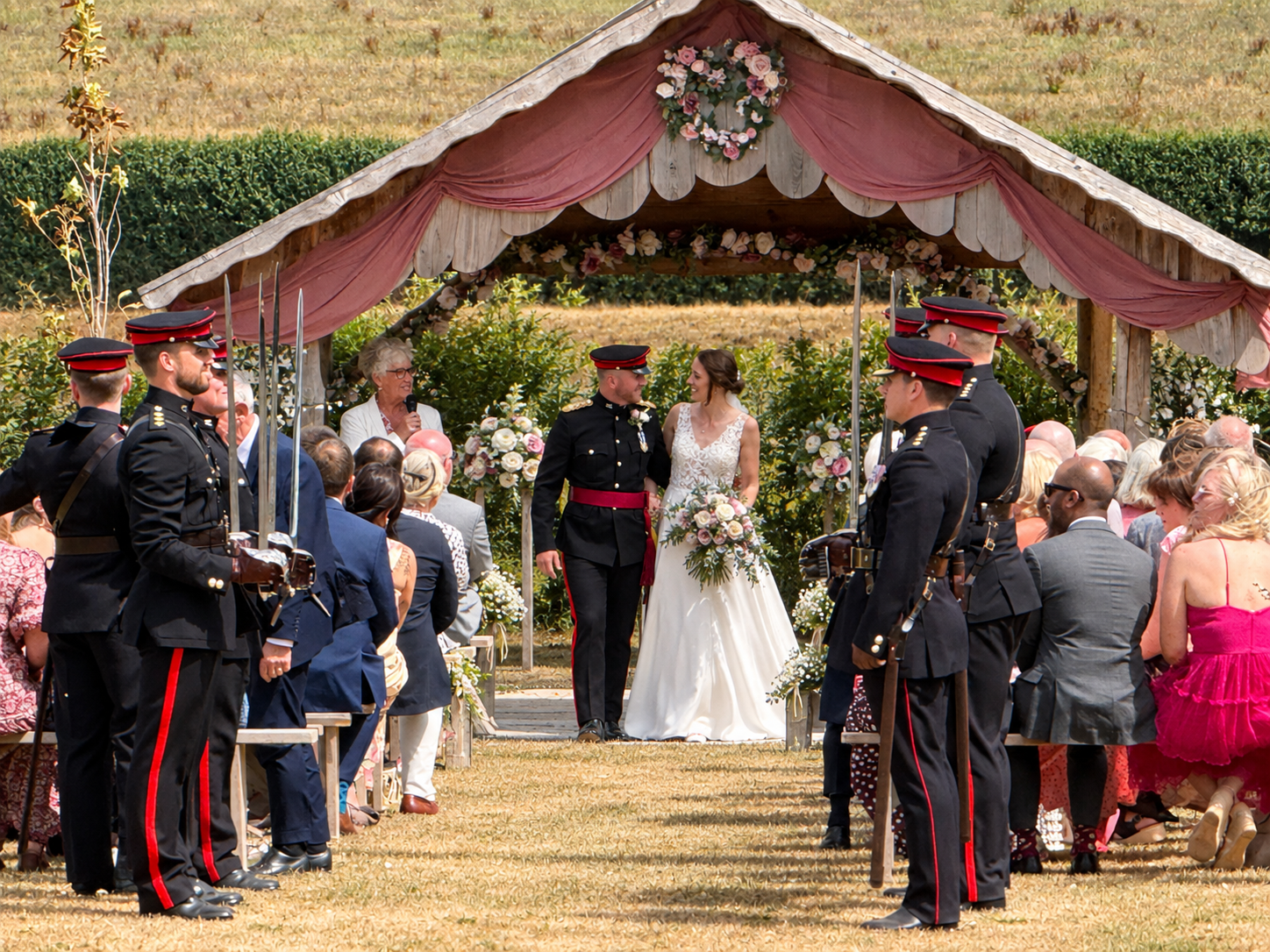 Bride and groom at their lakeside military wedding ceremony at Stanford Farm