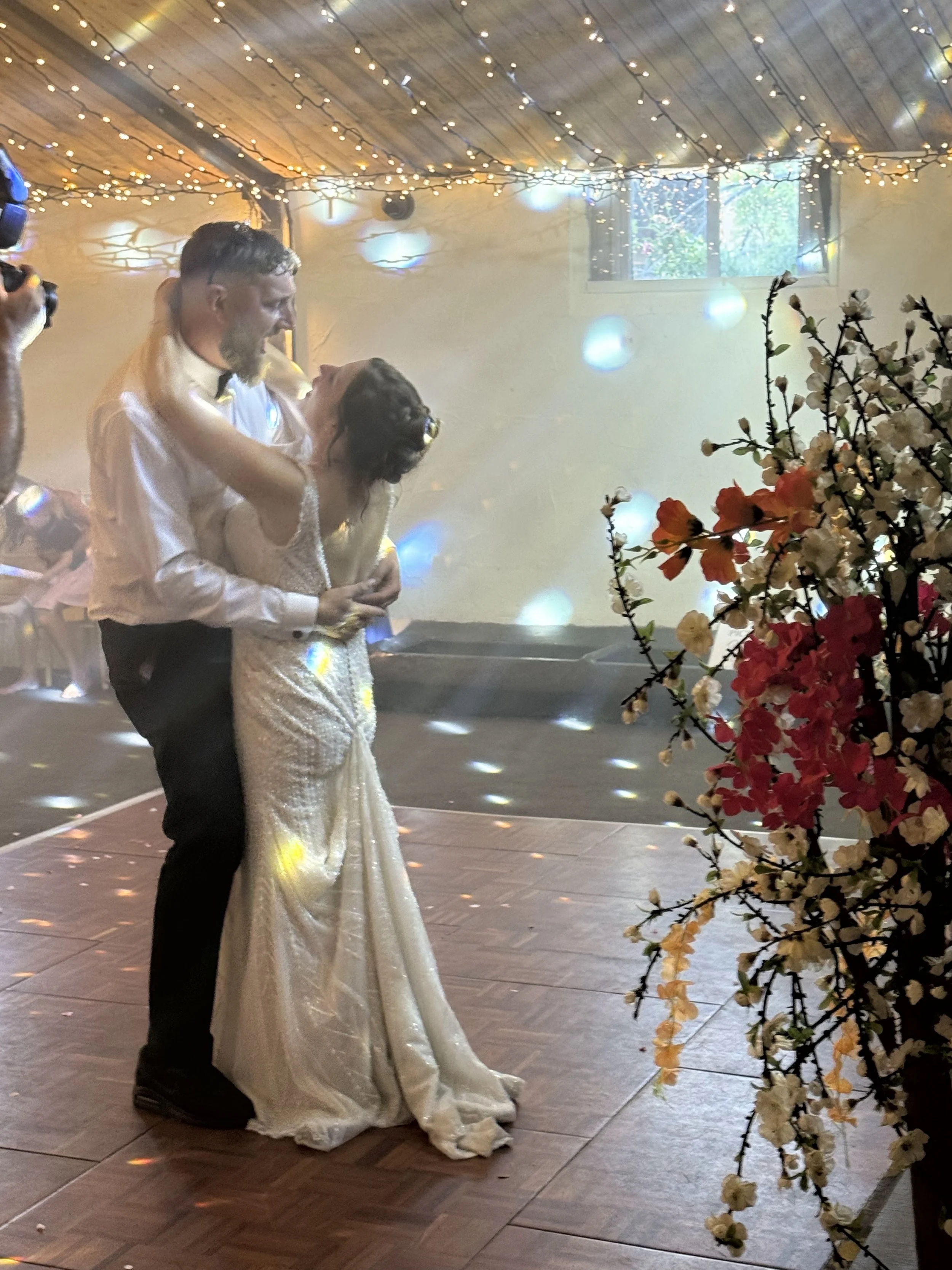 First dance at Claire and Mark’s Sunny Lakeside Wedding at Stanford Farm
