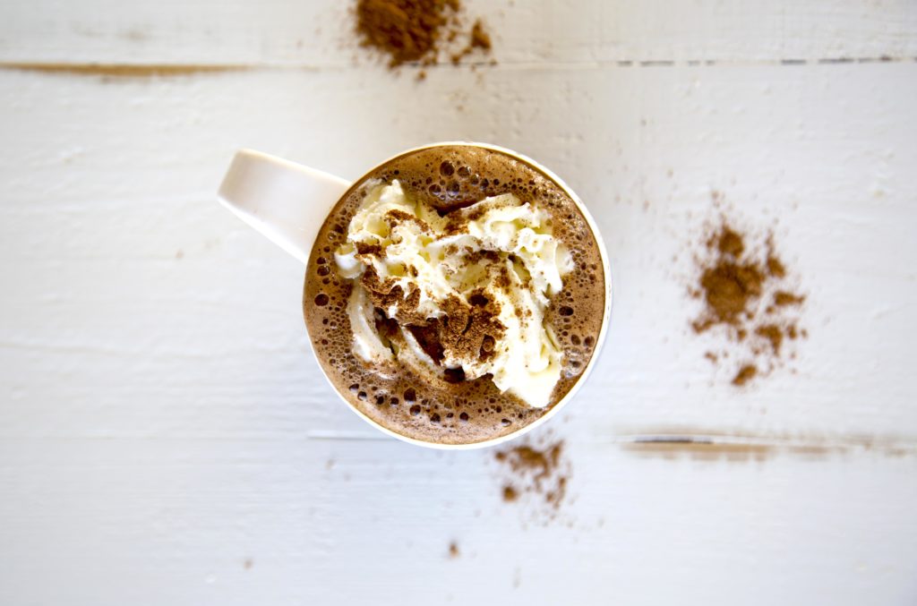 The Recipe: Coconut Hot Chocolate Servings: 2 Ingredients: 16 oz canned organic BPA free coconut milk 1 Tbsp coconut oil ( sub ghee or grass-fed butter) 3 Tbsp cacao powder 1 tsp vanilla bean powder 1 tsp honey, 2-3 stevia or 1 tsp xylitol to taste Whip cream (optional, but sometimes necessary!) Instructions: Heat the coconut milk in a saucepan until almost boiling. Stir in coconut oil, vanilla bean powder, cacao powder, and your choice of sweetener. Whisk until all ingredients are melted. Pour into mug and top with whip cream. (Torie suggests the coconut whipped cream from Sprouts) If you like it spicy, add a dash of cayenne pepper; it’s tasty and will give your metabolism a boost.
