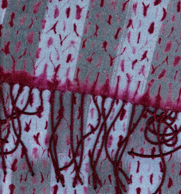 Detail of woven shibori scarf with painted warp.