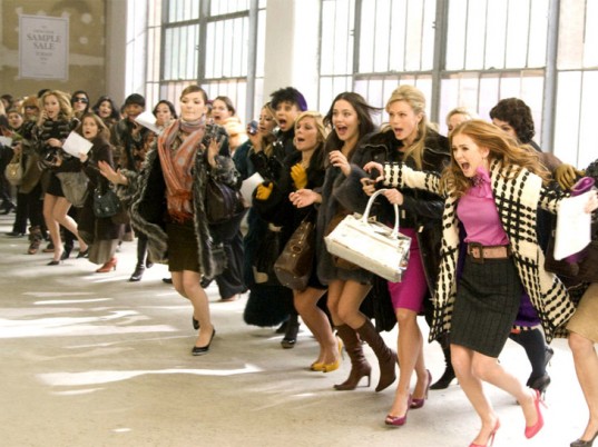 Isla Fisher in Confessions of a Shopaholic is probably what all of us look like at the sight of bargain or new collection release