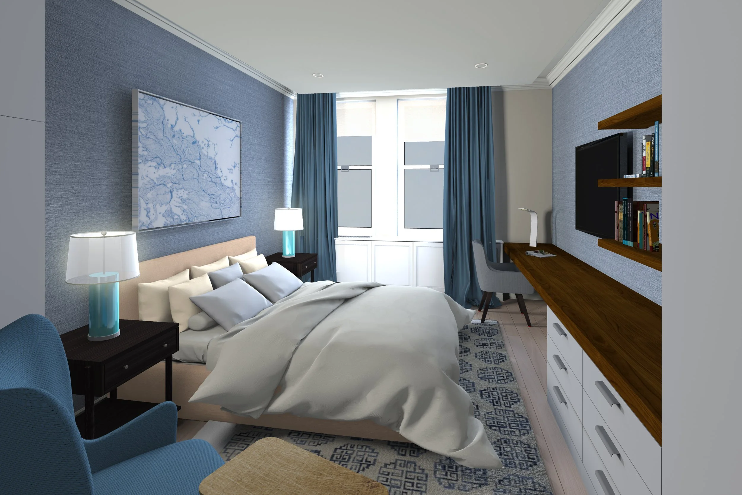 A sophisticated hotel room designed by Marie Burgos with blue grasscloth wallpaper, featuring a beige bed, dark nightstands, a patterned rug, a built-in wooden desk, and a blue armchair.