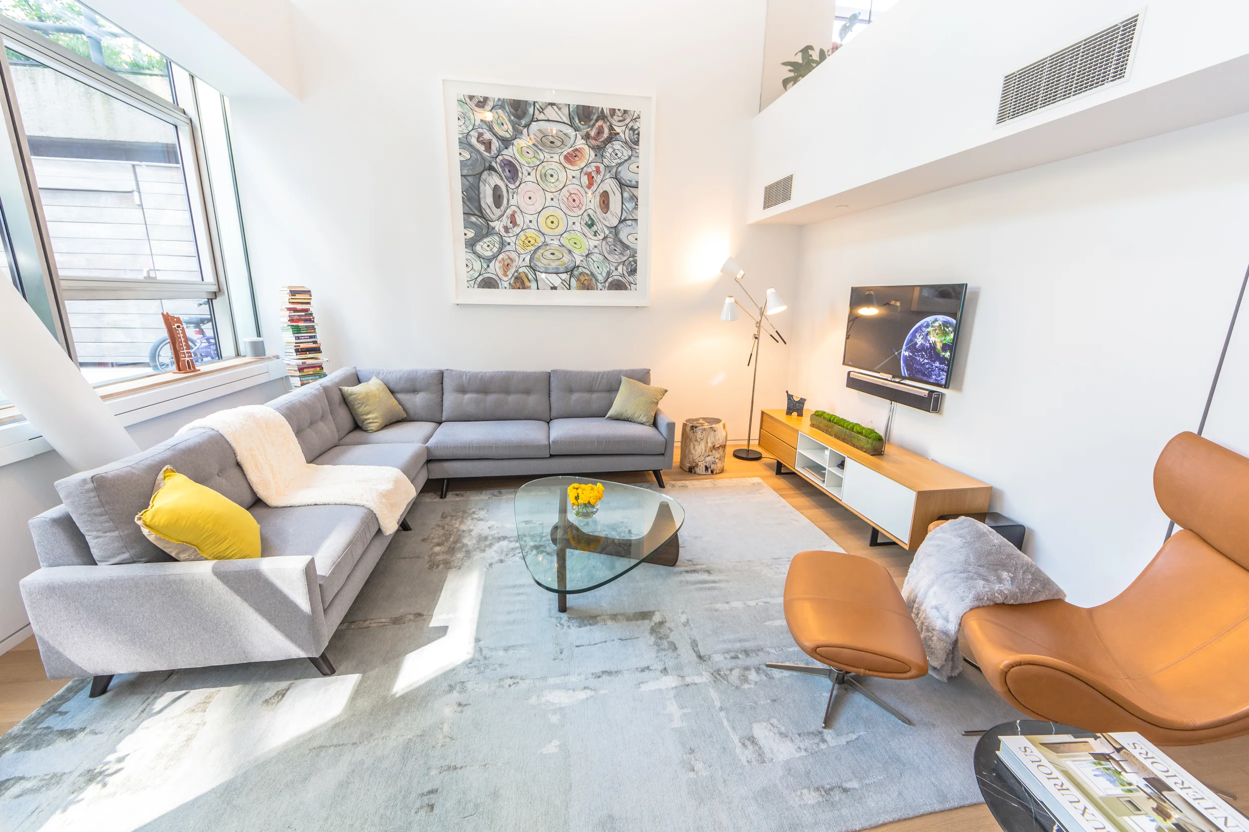 CHELSEA DUPLEX An Open And Airy Duplex In Chelsea Boosts A Mix Of Mid-Century Modern With Clean Lines And Custom Eclectic Pieces To Create A Very Cozy Space.