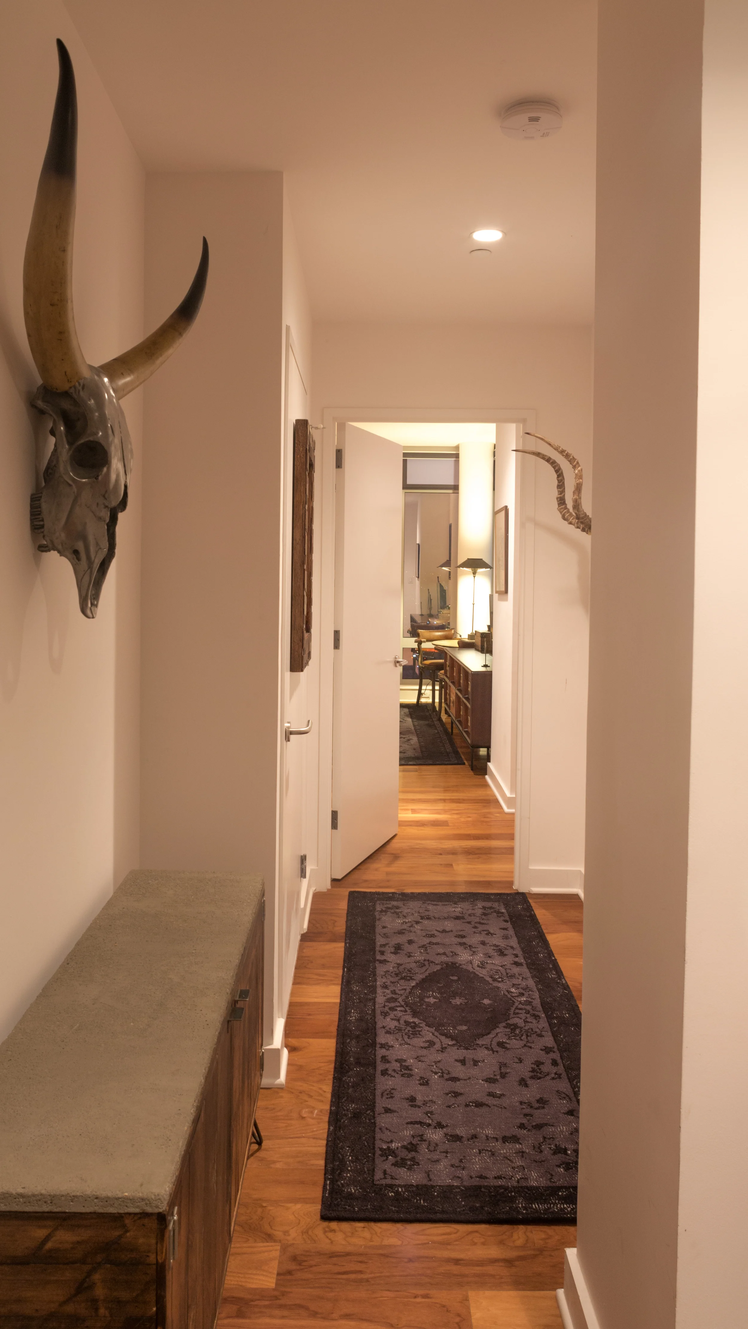 INDUSTRIAL ANTIQUARIAN RESIDENCE Rooted In The Story Of The Homeowner’s Life, The Design Layers Vintage Items, Industrial Chic Metals, Intriguing Antiquities And Controversial Artwork.