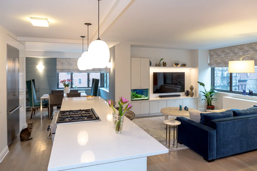Aquarium and custom-made cabinetry by Marie Burgos Design
