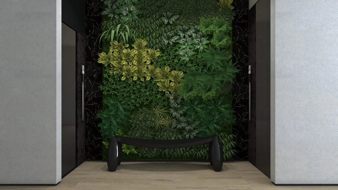 Entry with a living green wall between black marble panels, showing the Feng Shui Wood element