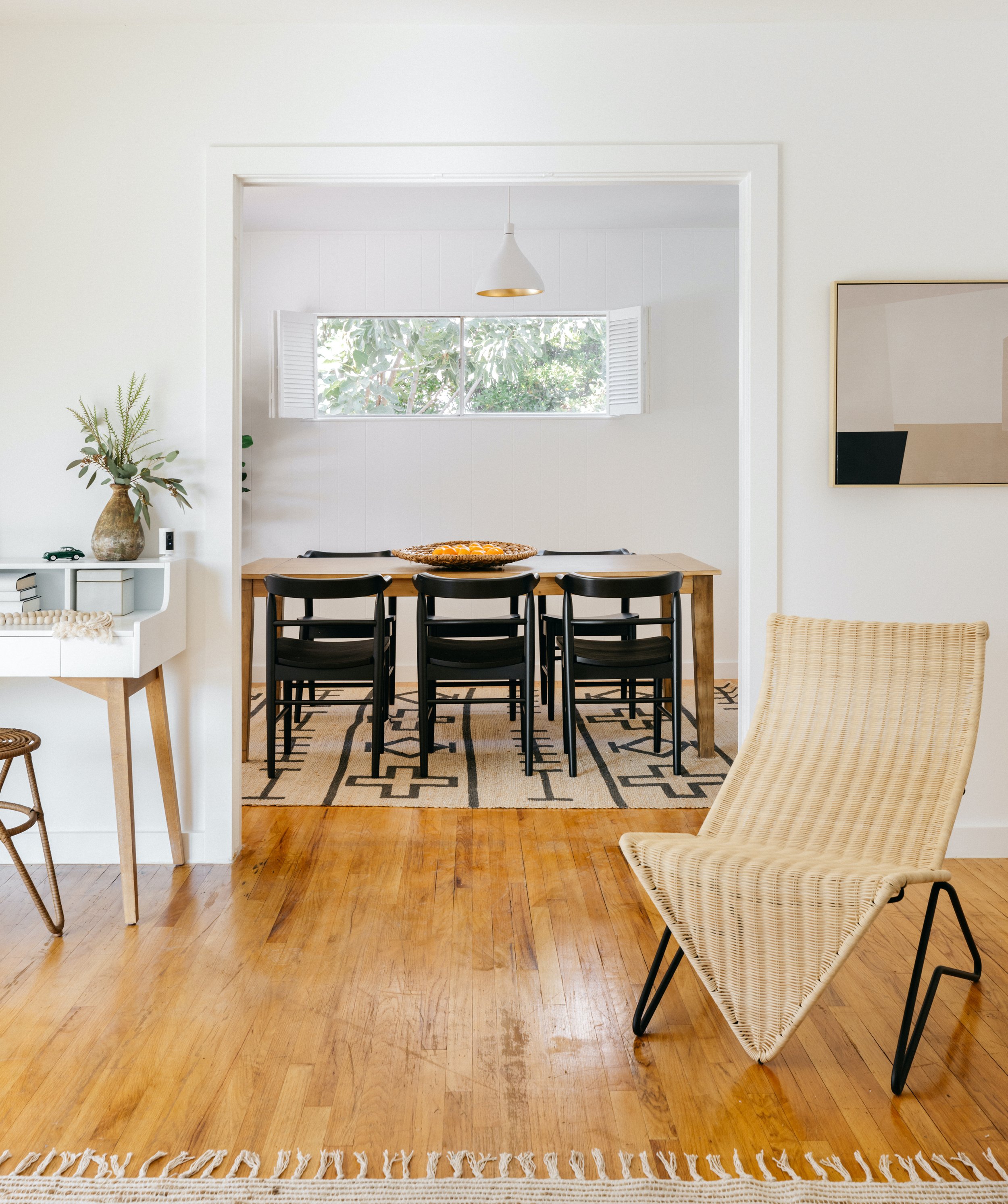 a room with a table and chairs
