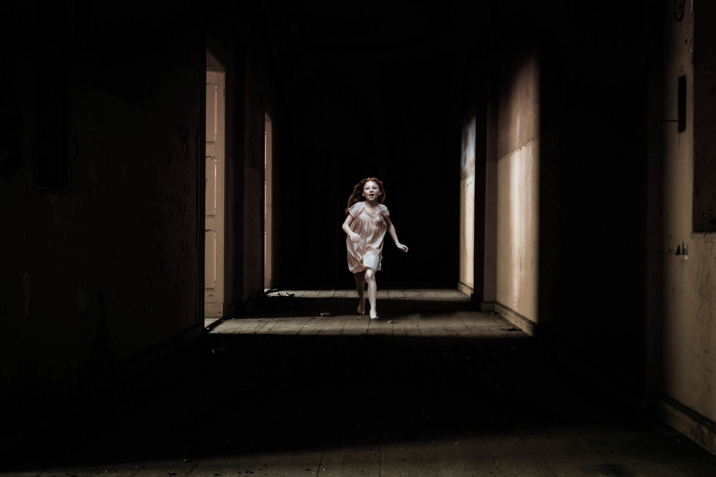 Girl Running Through Hallways.jpg