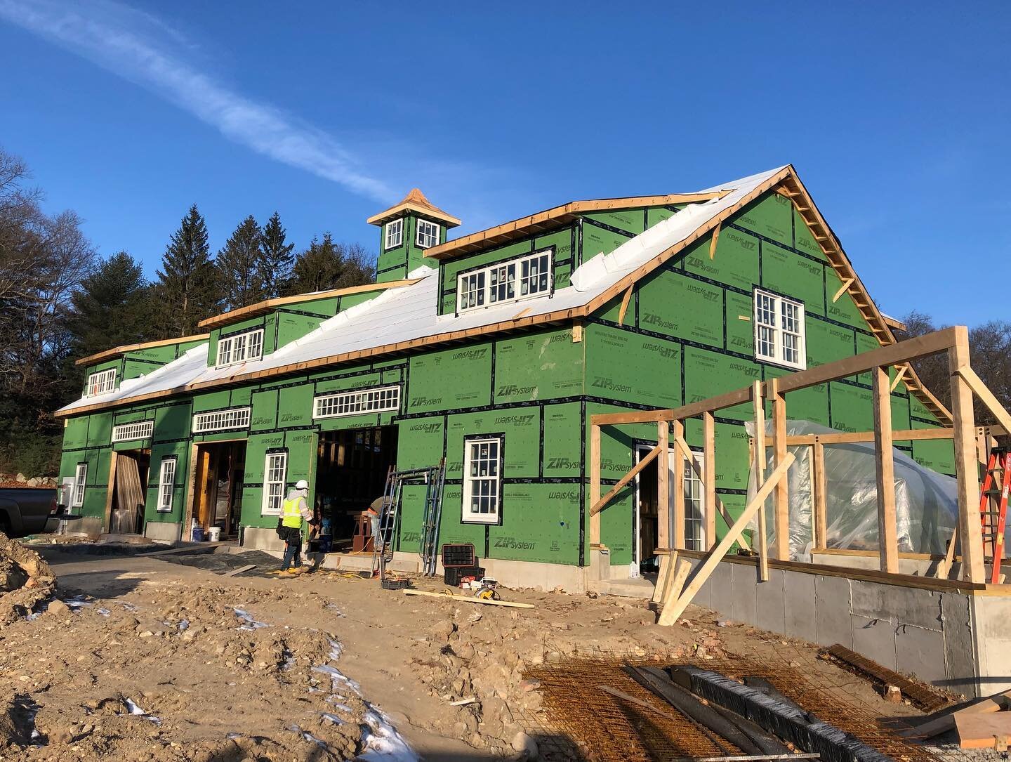 The recent cold and gloomy winter weather has not stopped progress on one of our barn projects. Strategic coordination of grid lines, ceiling heights, and materials not only creates a narrative between the garage and entertainment areas internally, b