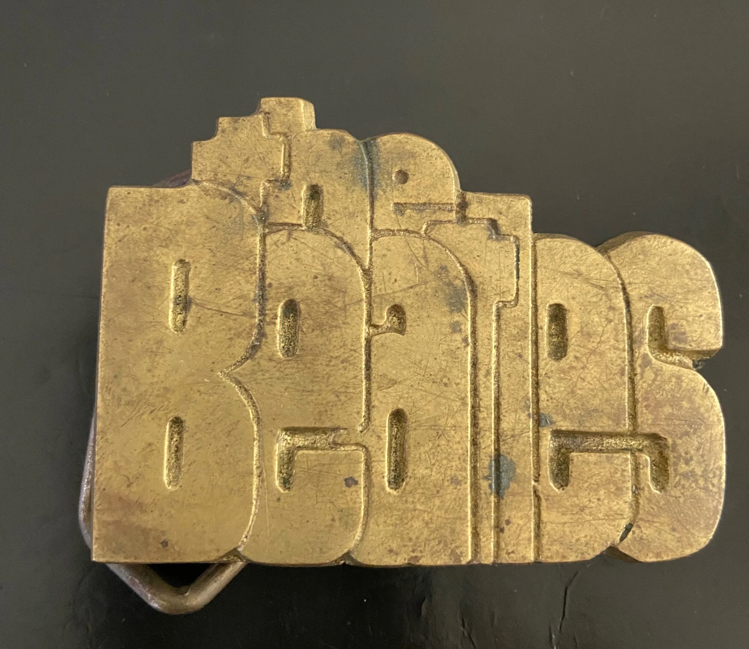 BEATLES BRASS BELT.jpeg