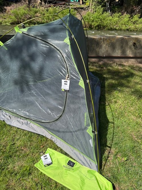 LOGO TENT PART VIEW CREEK 1.jpg