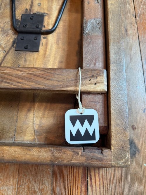 LOGO BENCH FOLDED CLOSEUP 3.jpg