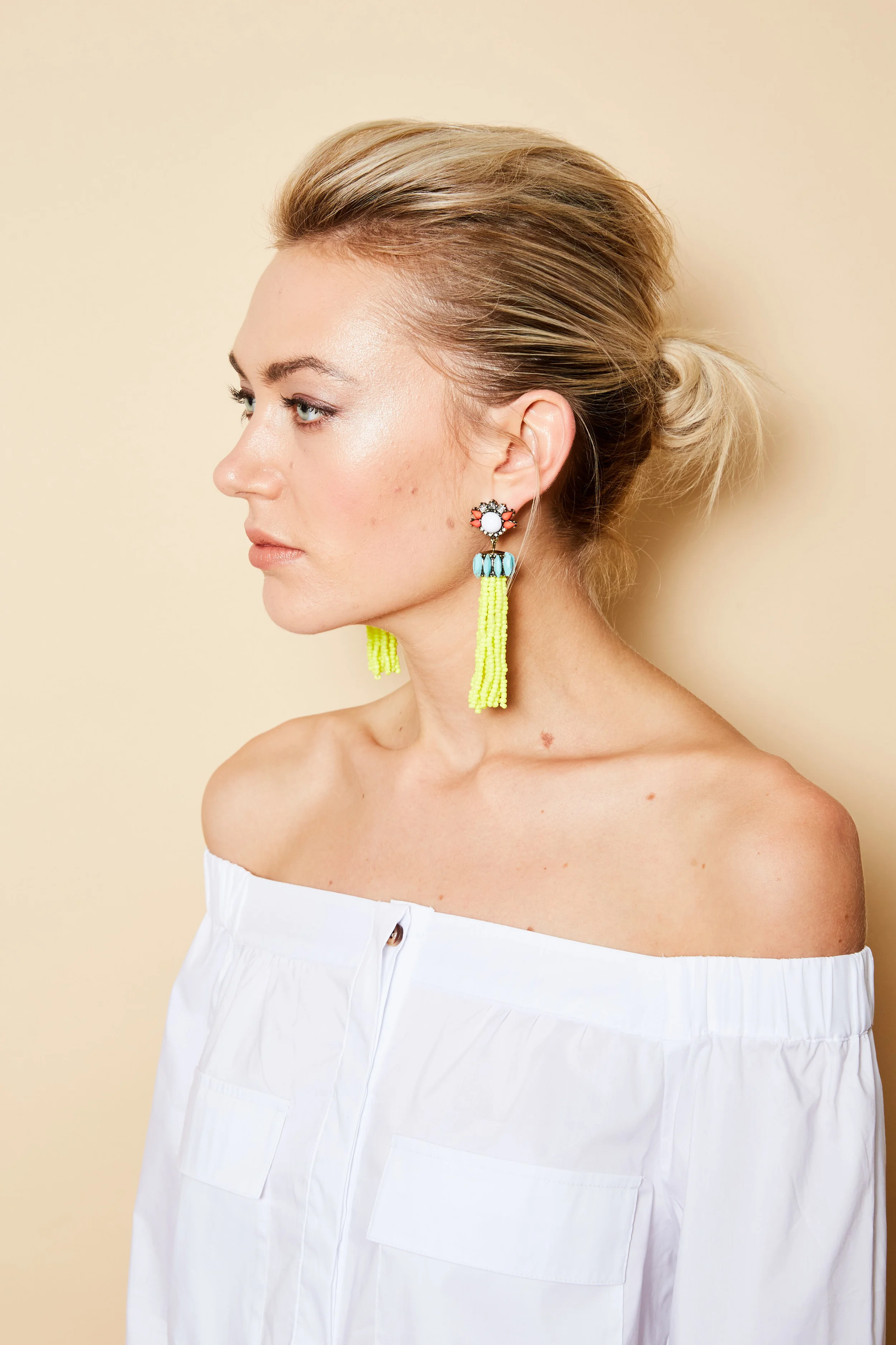 Baublebar earrings, baublebar.com . Marled by Reunited Clothing top, marledbyreunitedclothing.com .