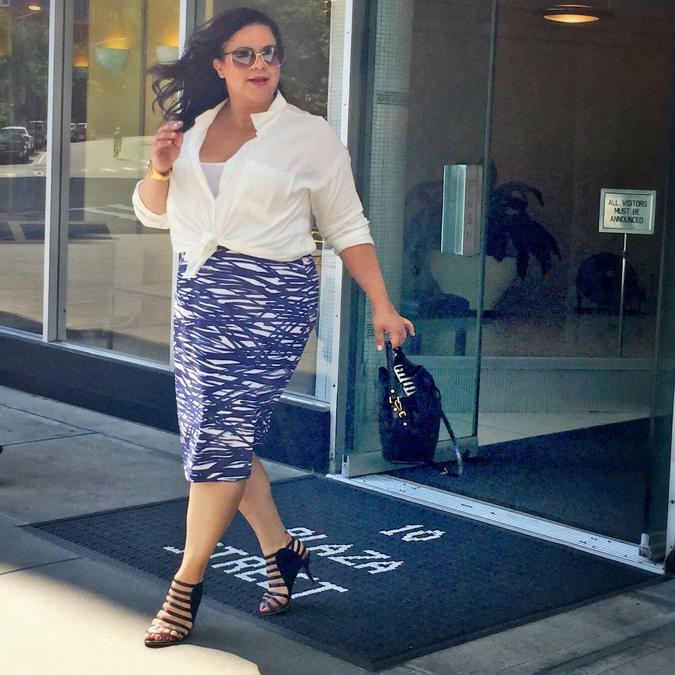 Photographed by Jennifer Loeber . Top by Forever21+ . Skirt by Lafayette 148 Plus . Shoes by & Other Stories .