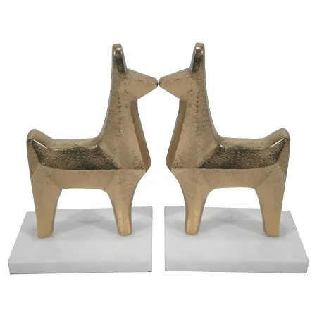 "During my time working in magazines, I collected a large selection of fashion and decorative coffee table books. I absolutely love these little l lama bookends ( $19.99 )—they liven up my bookcase and keep things fun!"