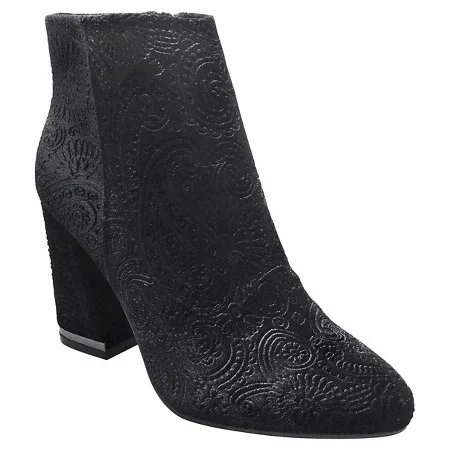 "I wear booties almost every day during the winter, and black is usually my go-to. These paisley velvet ones ( $44.99 ) are not your average black booties. They act as a statement piece, but they match almost anything in your closet!"