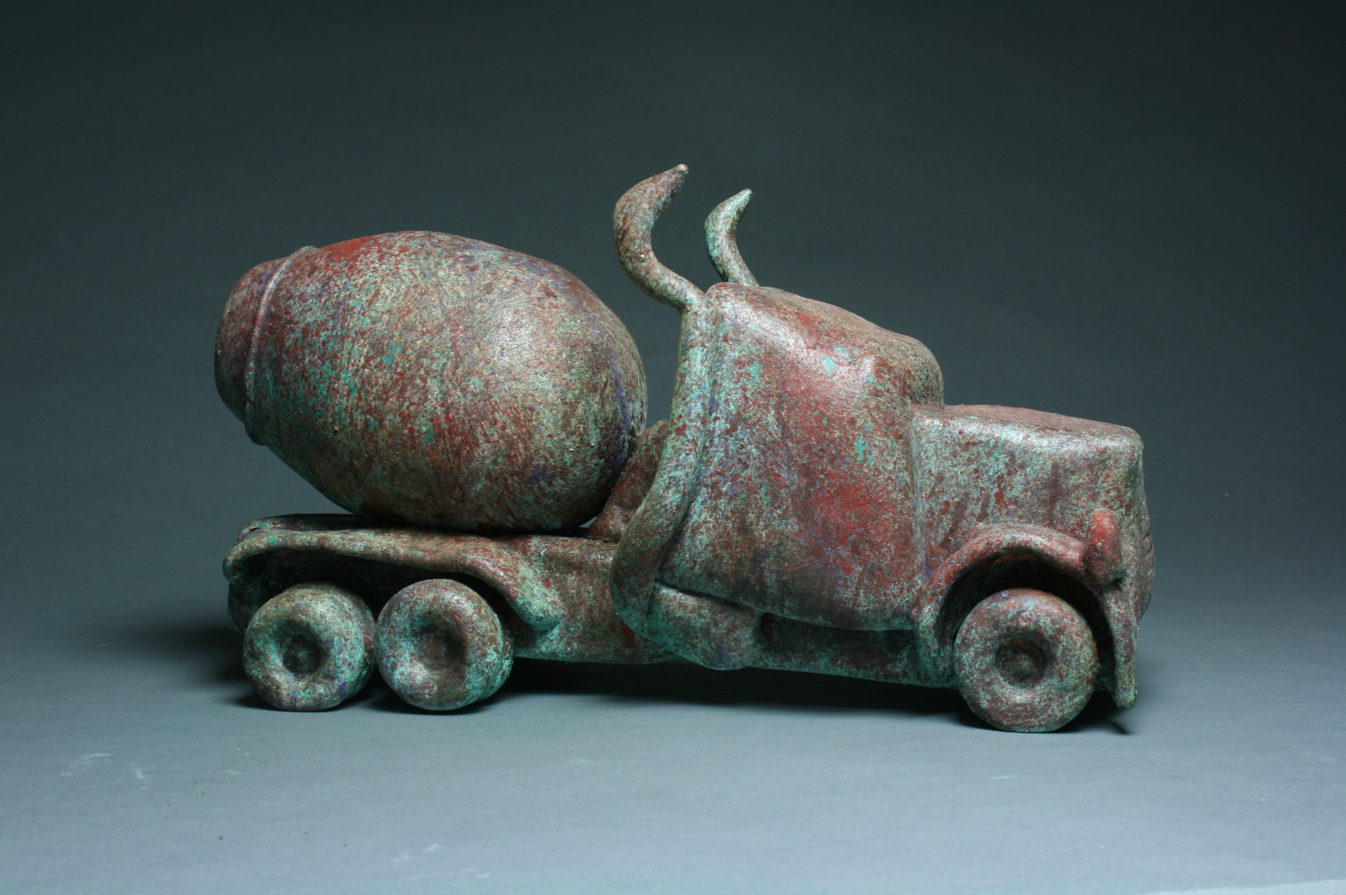 James A. Breed  Mixer  ,  free form hot sculpted,  bronzed with patina.  8.25inx15in.x6.5in..JPG