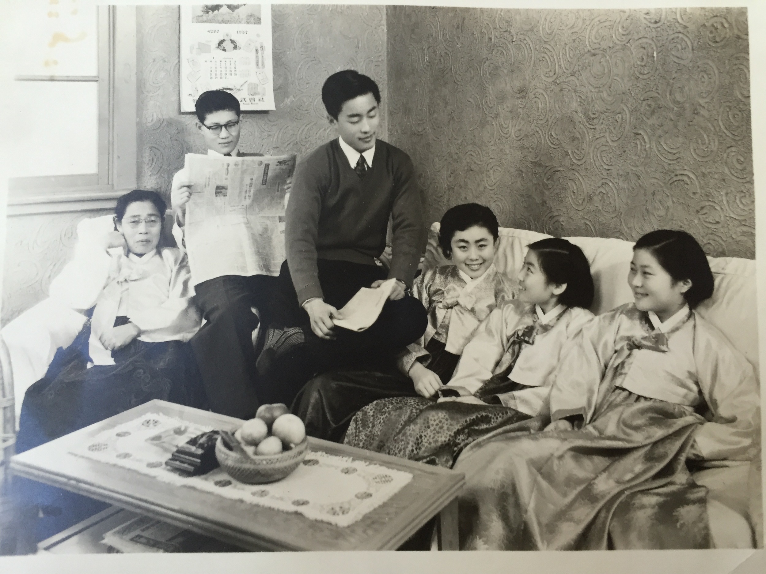 With her mom and siblings in Seoul, 1957