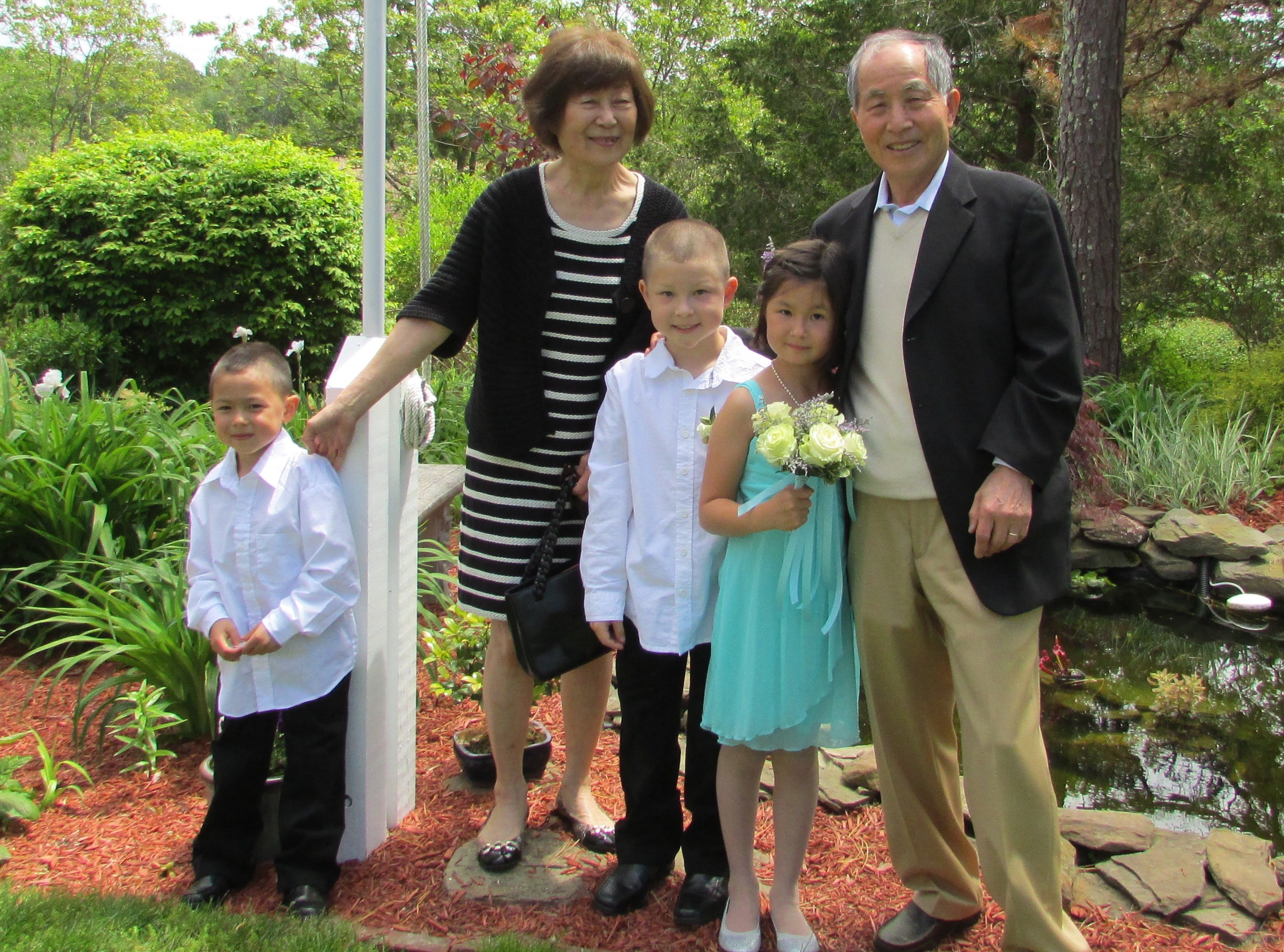 With his wife, Chan Soon Cho, and his grandchildren, on Cape Cod, 2014