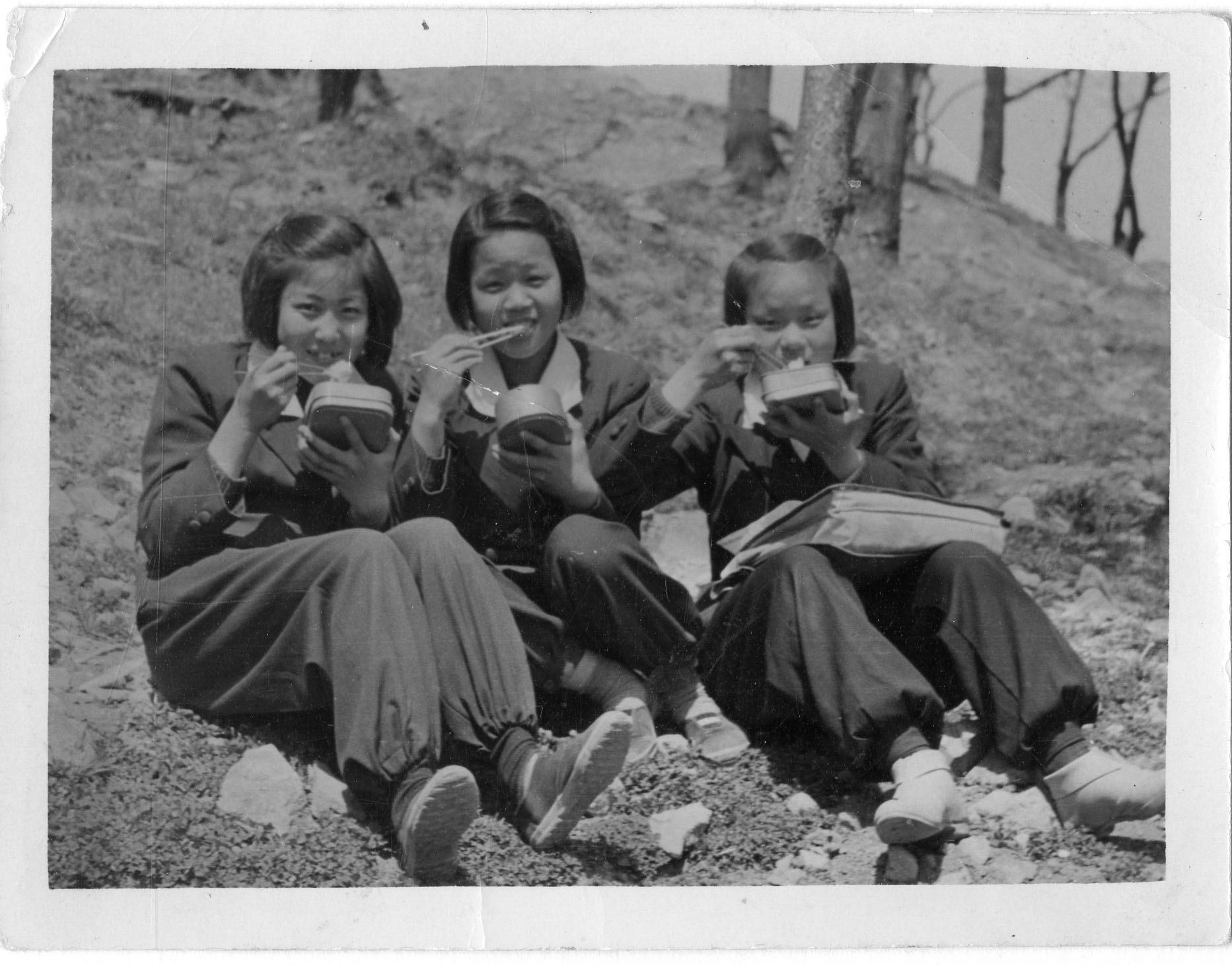 With her high school friends in Pusan during the Korean War