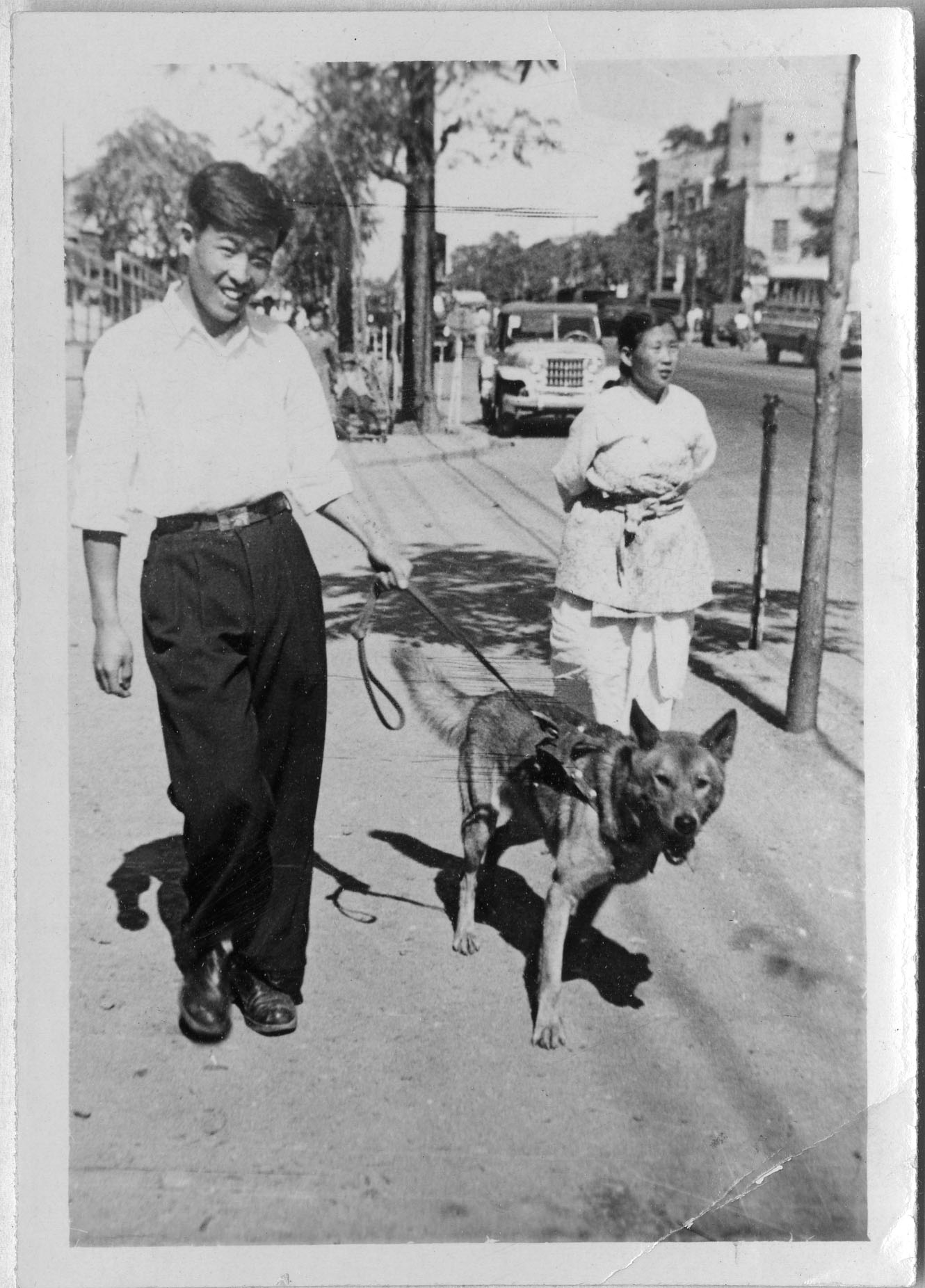 With is dog Hope, circa 1954