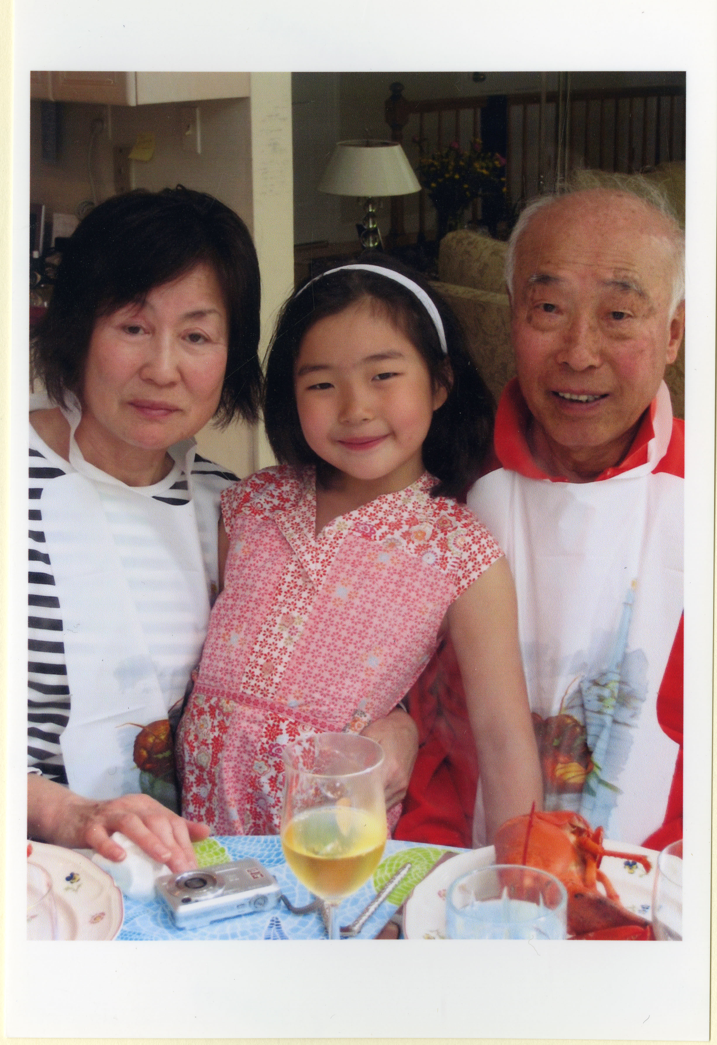 Chan Eai and Kook Dong Pae with their grandchild, 2006