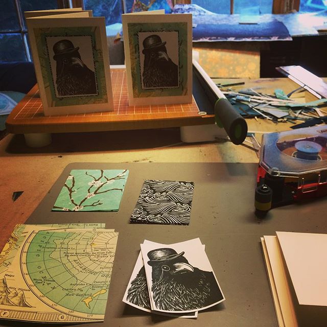 Out of chaos comes the dance of balance! Grooving on some powerful women singers #mariboine and #ulali while happily assembling cards for the marvelous #whitprintholidaysale this weekend 12/7-9. #studiolife #linocut #linoprint #nopapercuts #whitprint