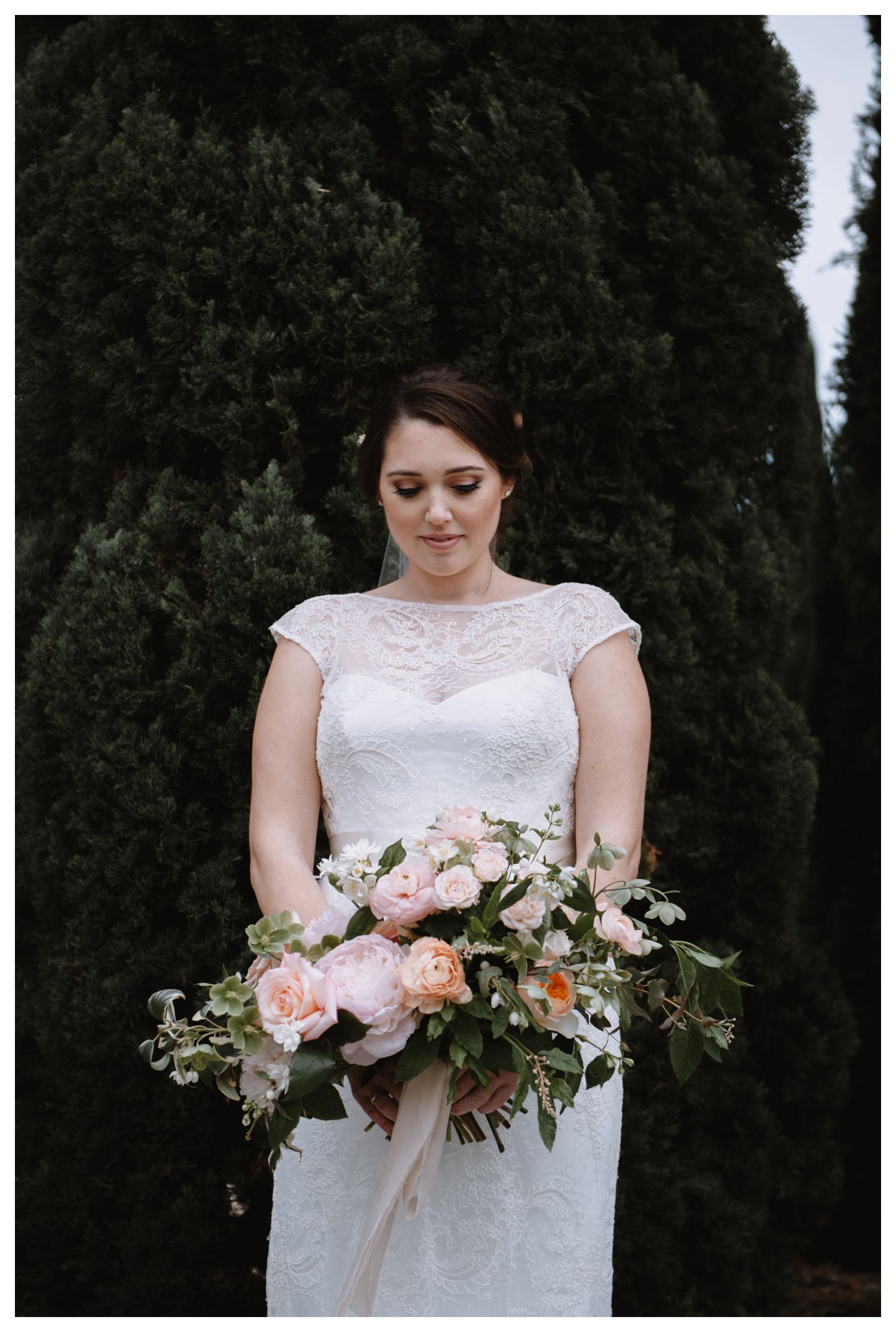 Beautiful pale pastel colors surround a bride on her wedding day