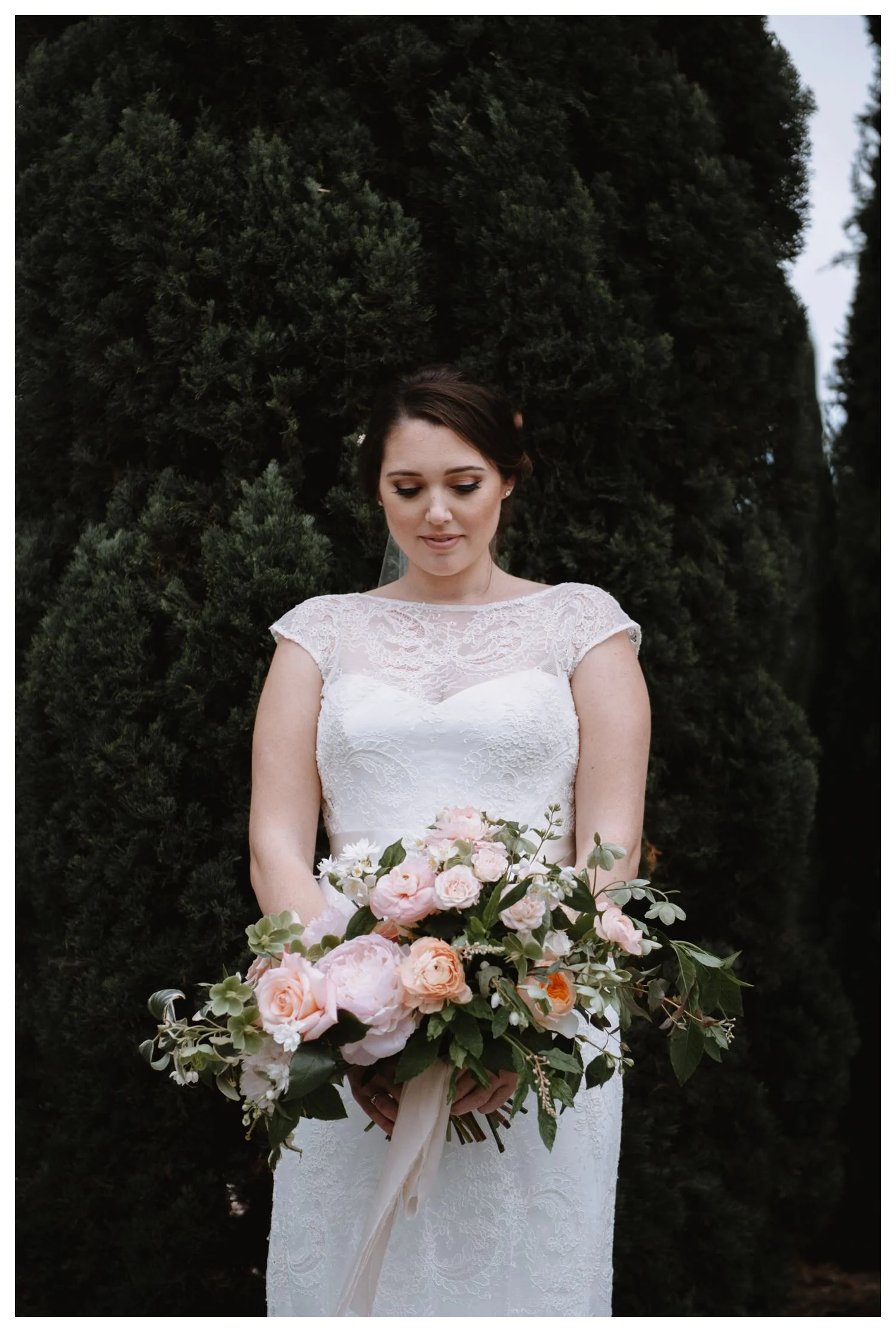 Beautiful pale pastel colors surround a bride on her wedding day