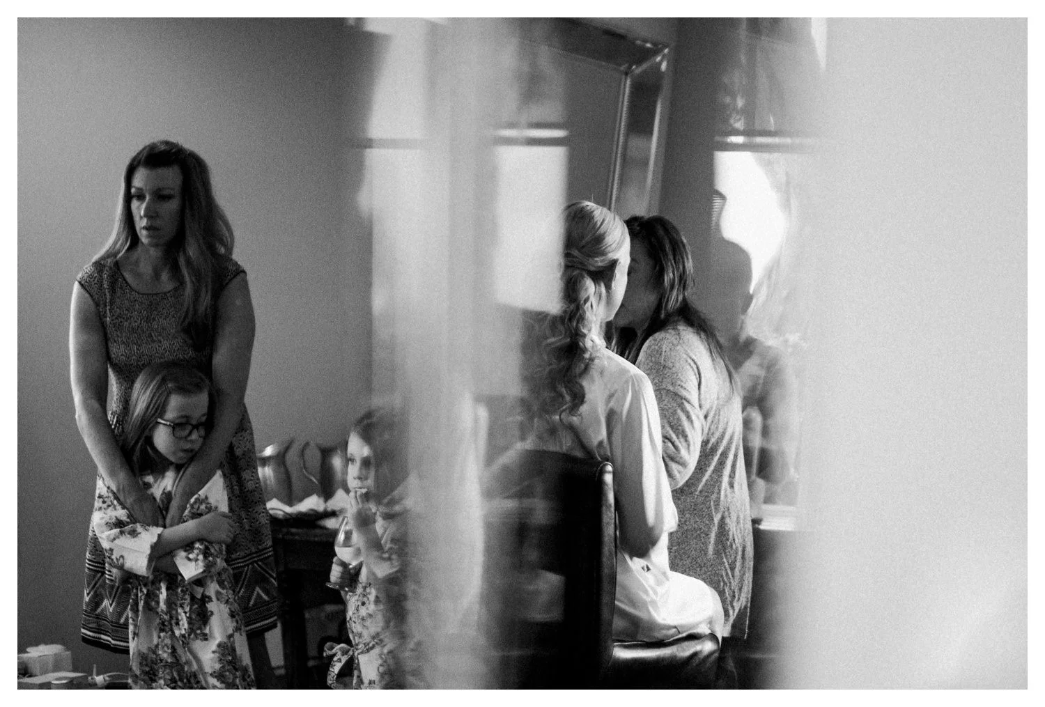 A candid wedding photo of a brides reflection