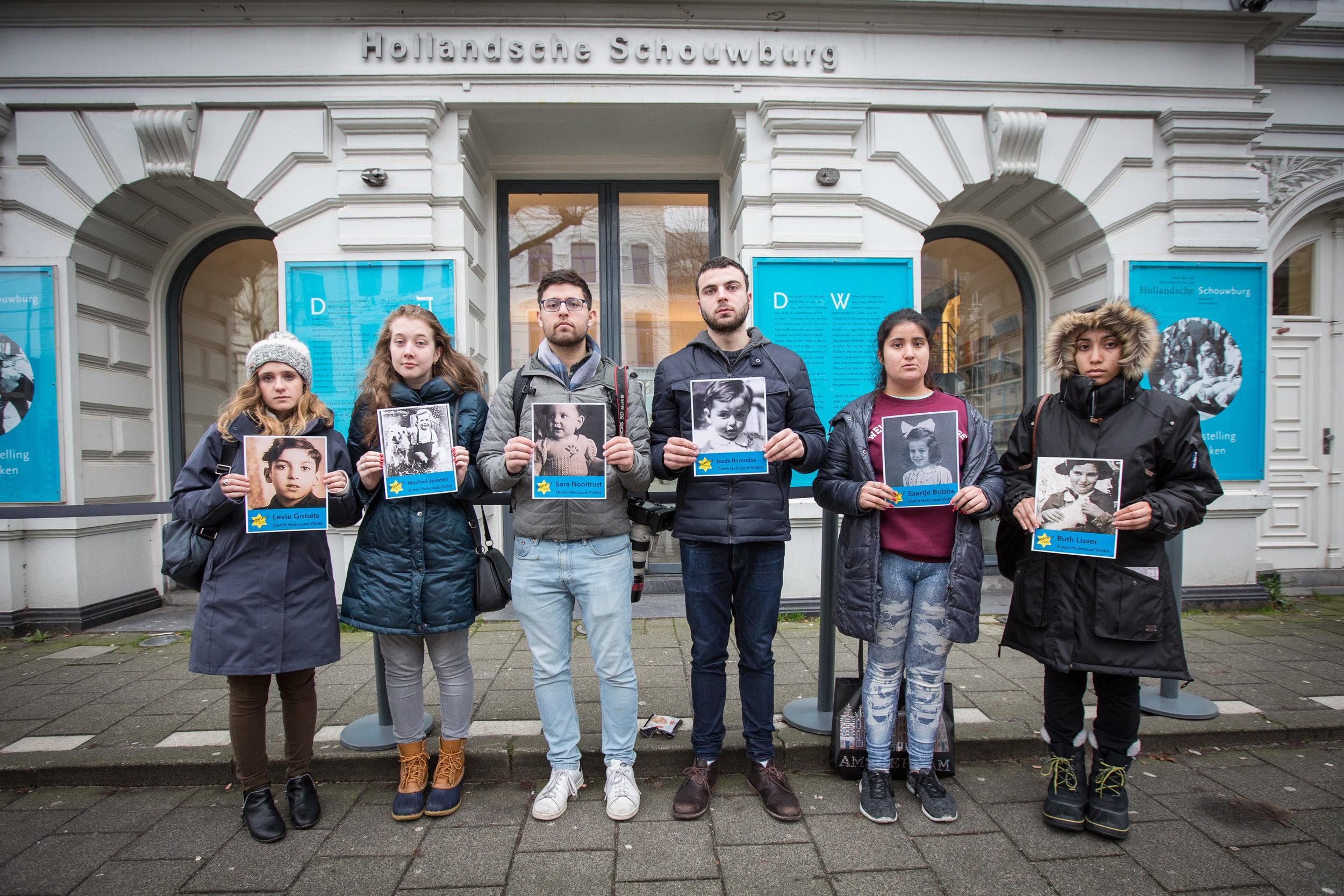 The Hollandsche Schouwburg (Dutch Theater) was used as a deportation center. In front of the theater, which is now a museum, Student Fellows held the names and faces of Dutch children who were killed during the Holocaust to honor their legacies.