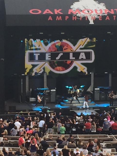 Tesla takes the stage... at least that's what the sign says. (They're everywhere so I understand)