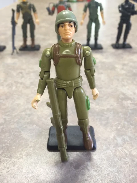 Zap the bazooka soldier from G.I. Joe 1982 (straight arm version). The thumbs are infamously brittle. 